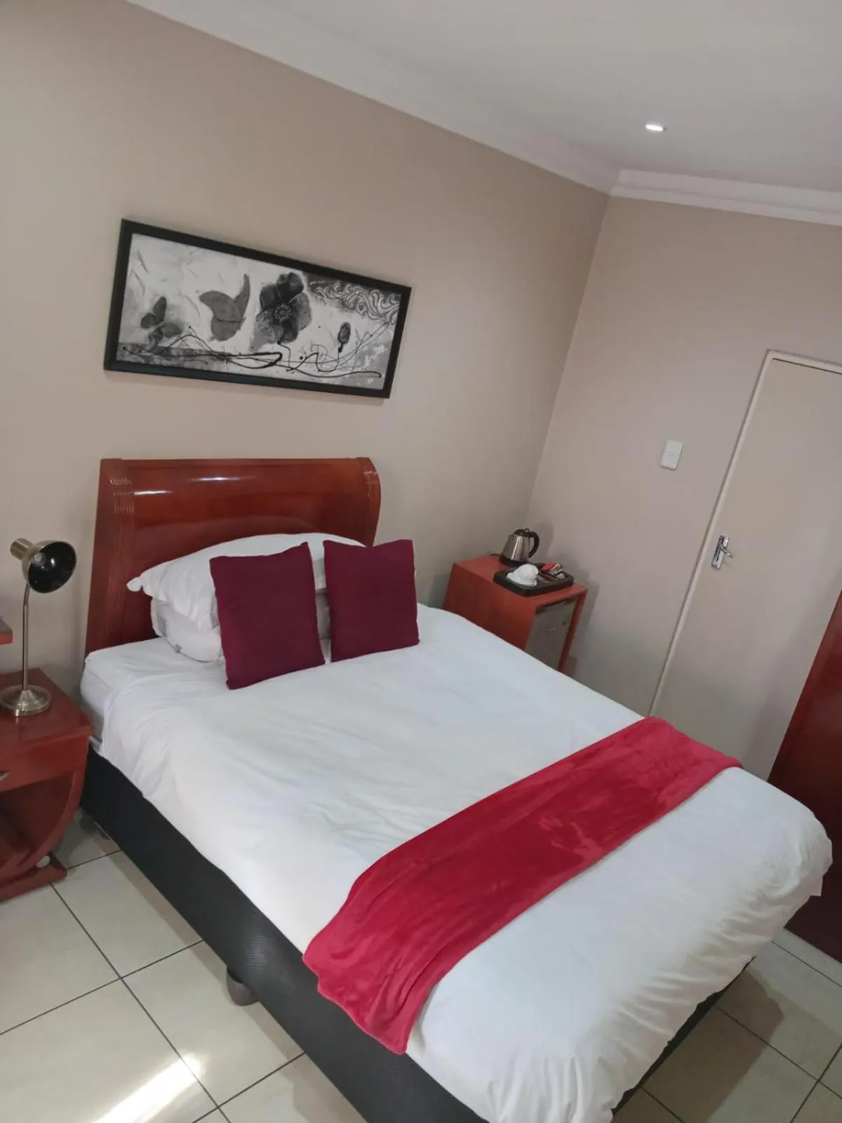 Bed in Lakeview Boutique Hotel & Conference Center