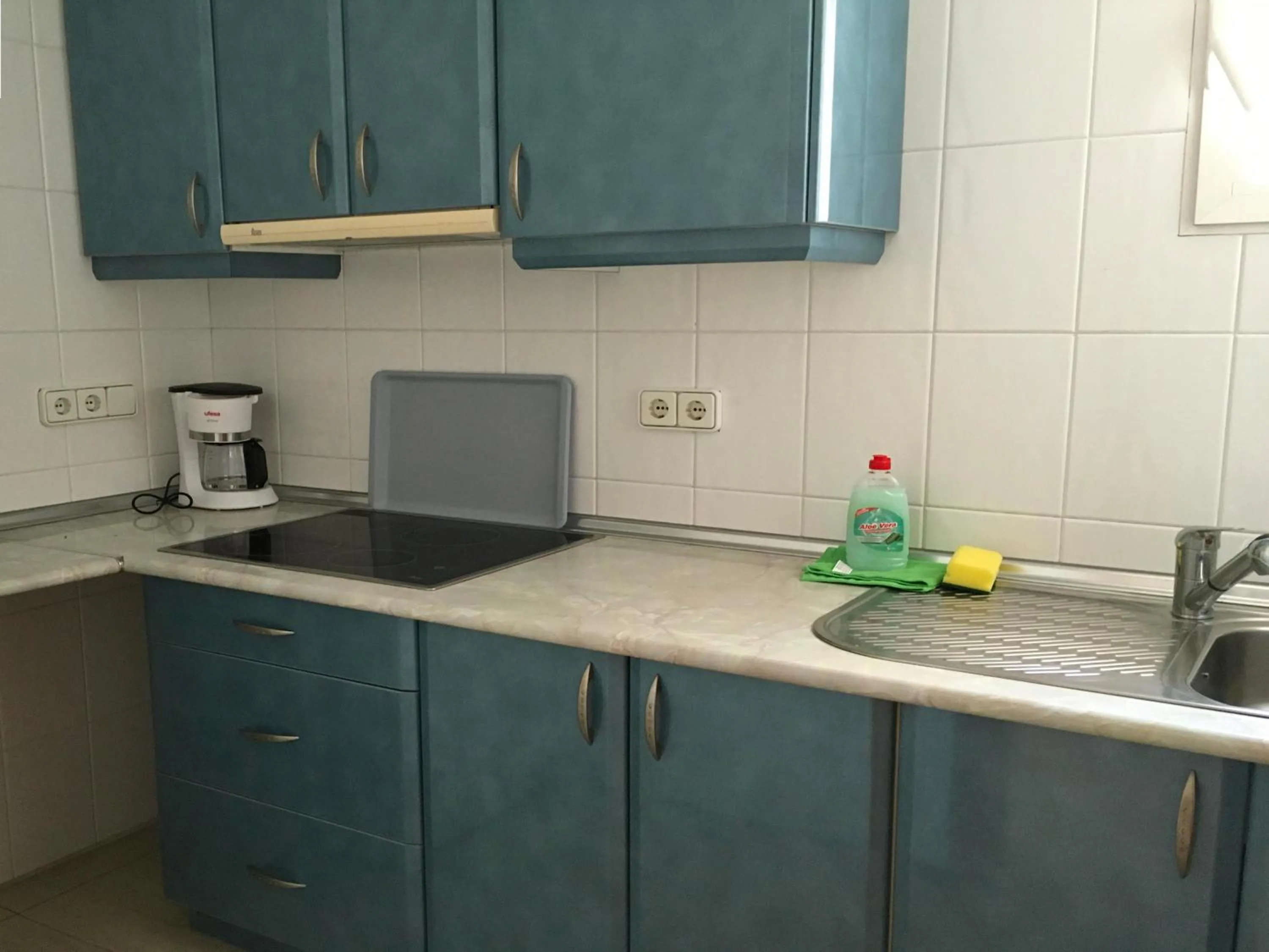 Kitchen or kitchenette in Apartamentos Bahia
