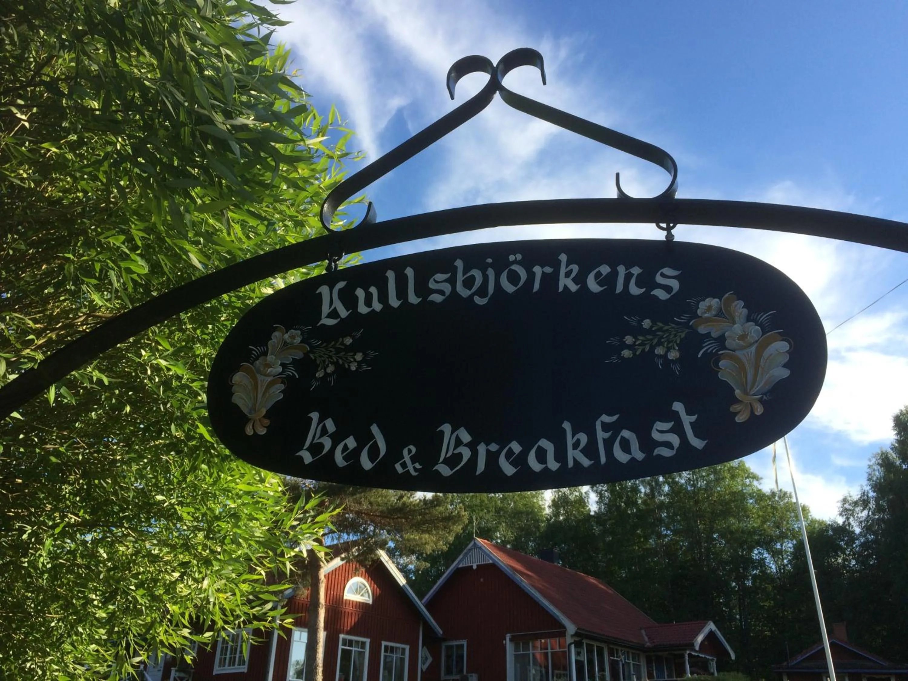 Property logo or sign in Kullsbjörken Bed & Breakfast