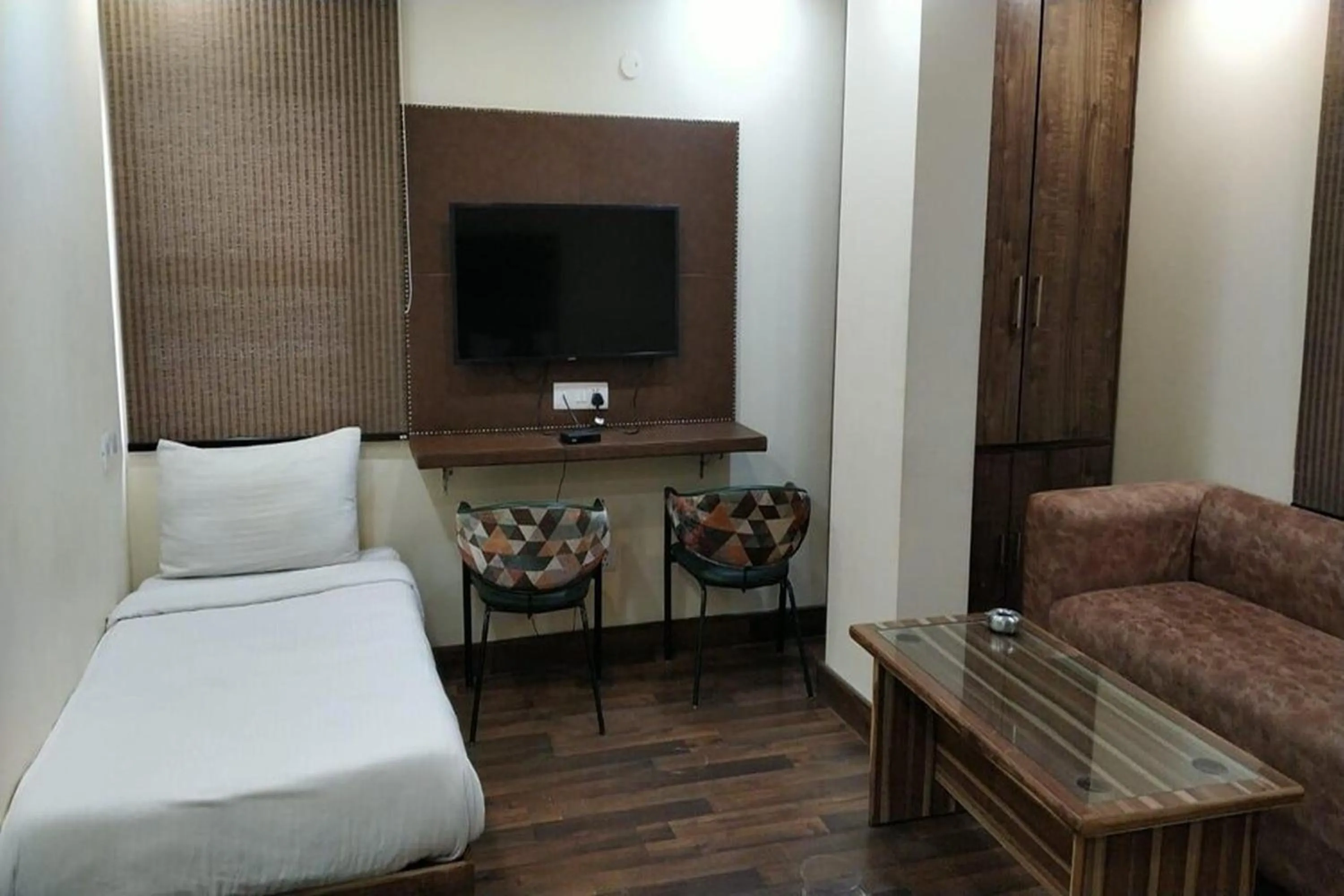 Bed in HOTEL SINGH CONTINETAL