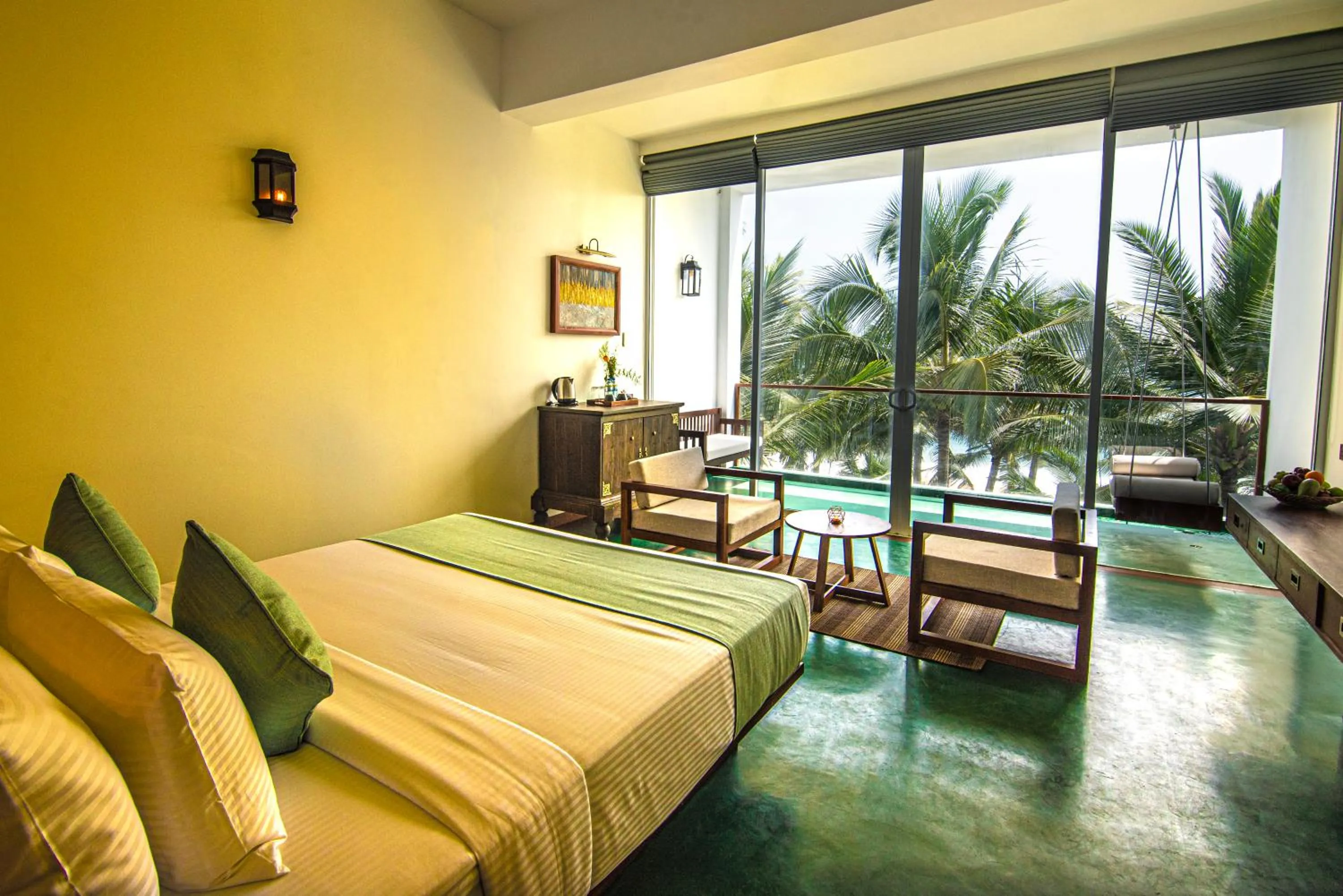 Seating area, Bed in The Rockwall Boutique Hotel Bentota