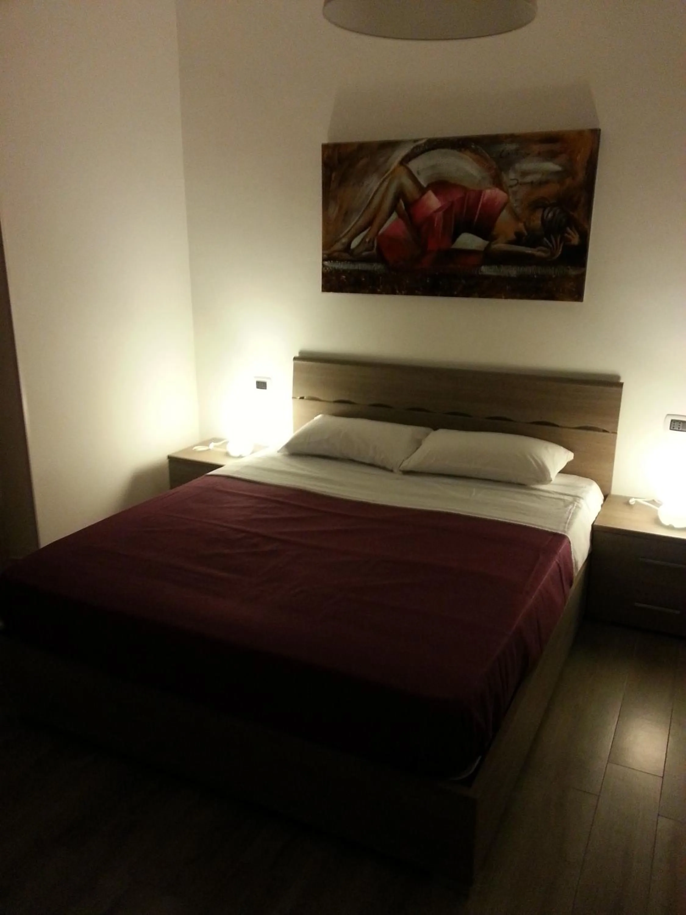 Decorative detail, Bed in Appartamento B&B Suite Stefanelli