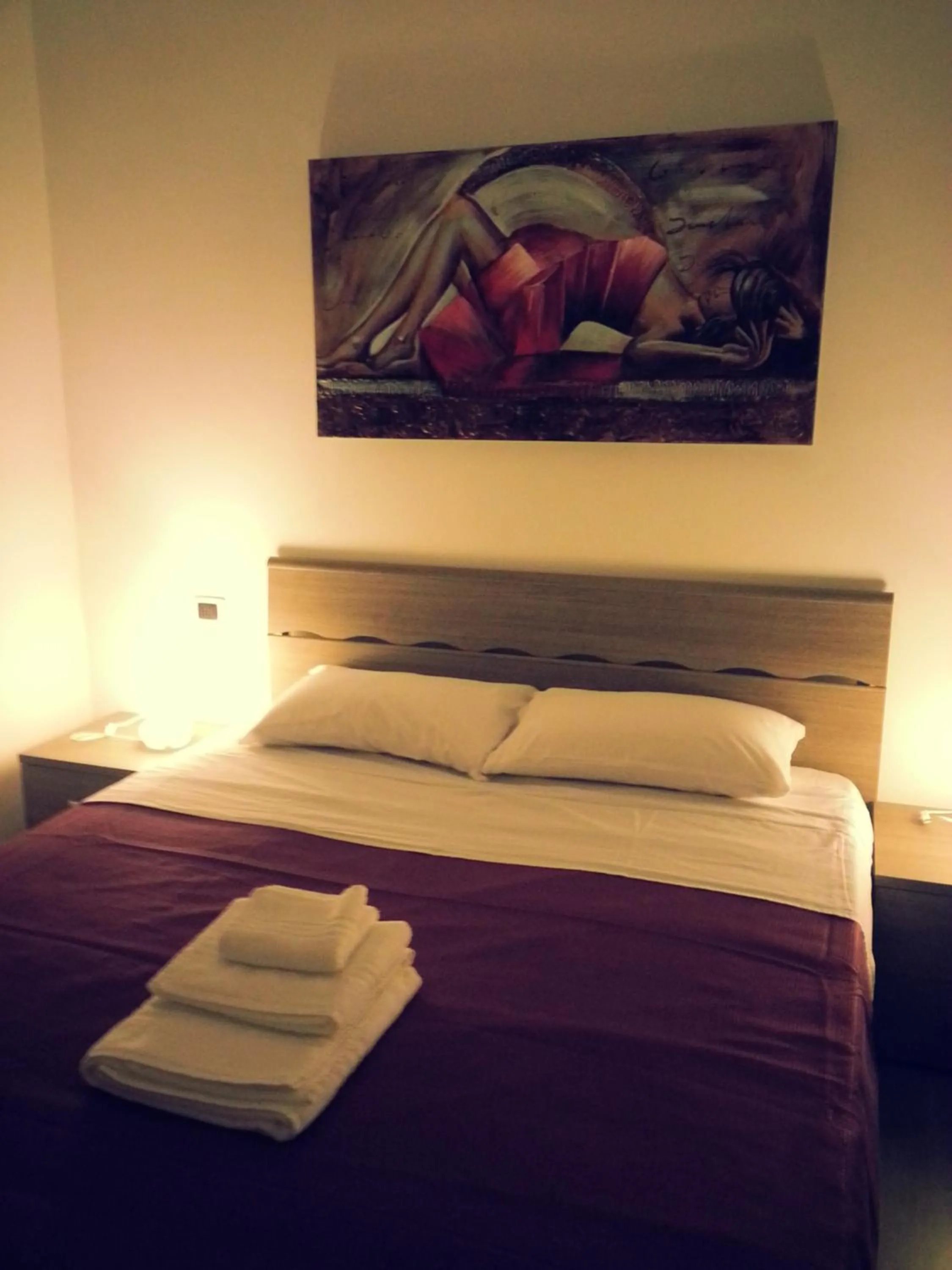 Decorative detail, Bed in Appartamento B&B Suite Stefanelli