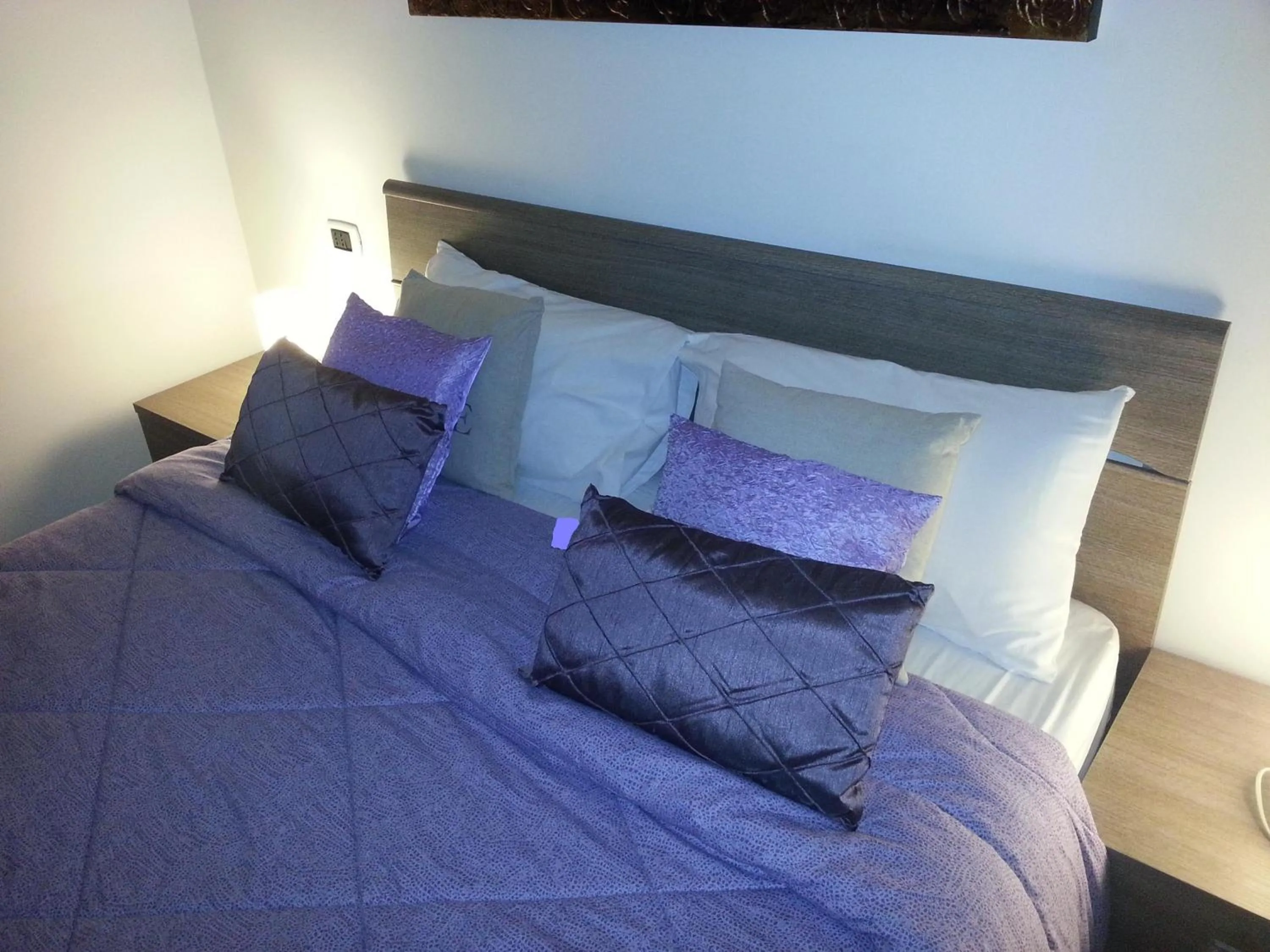 Decorative detail, Bed in Appartamento B&B Suite Stefanelli