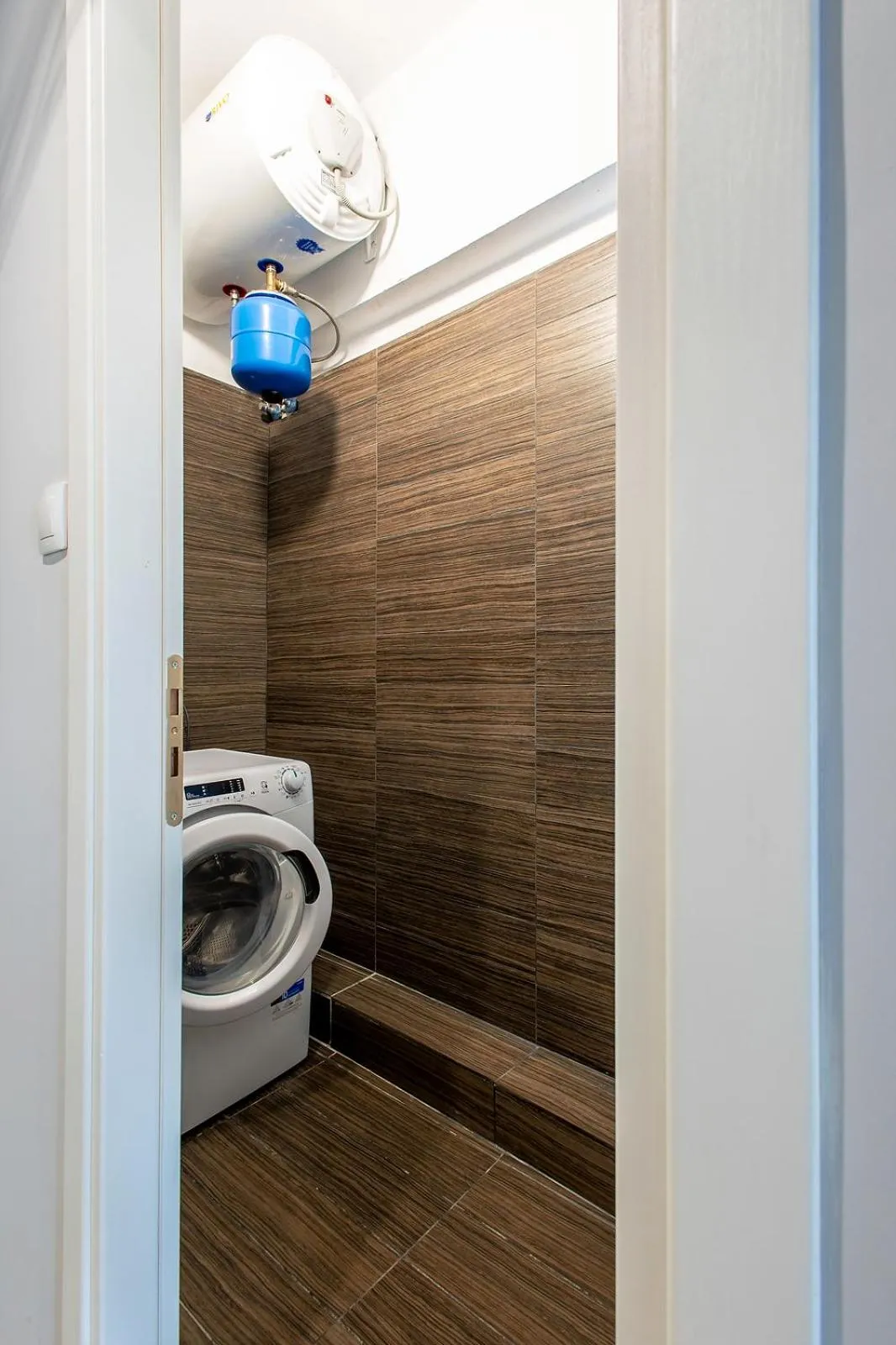 washing machine in Aris123 by Smart Cozy Suites - Apartments in the heart of Athens - 5 minutes from metro - Available 24hr