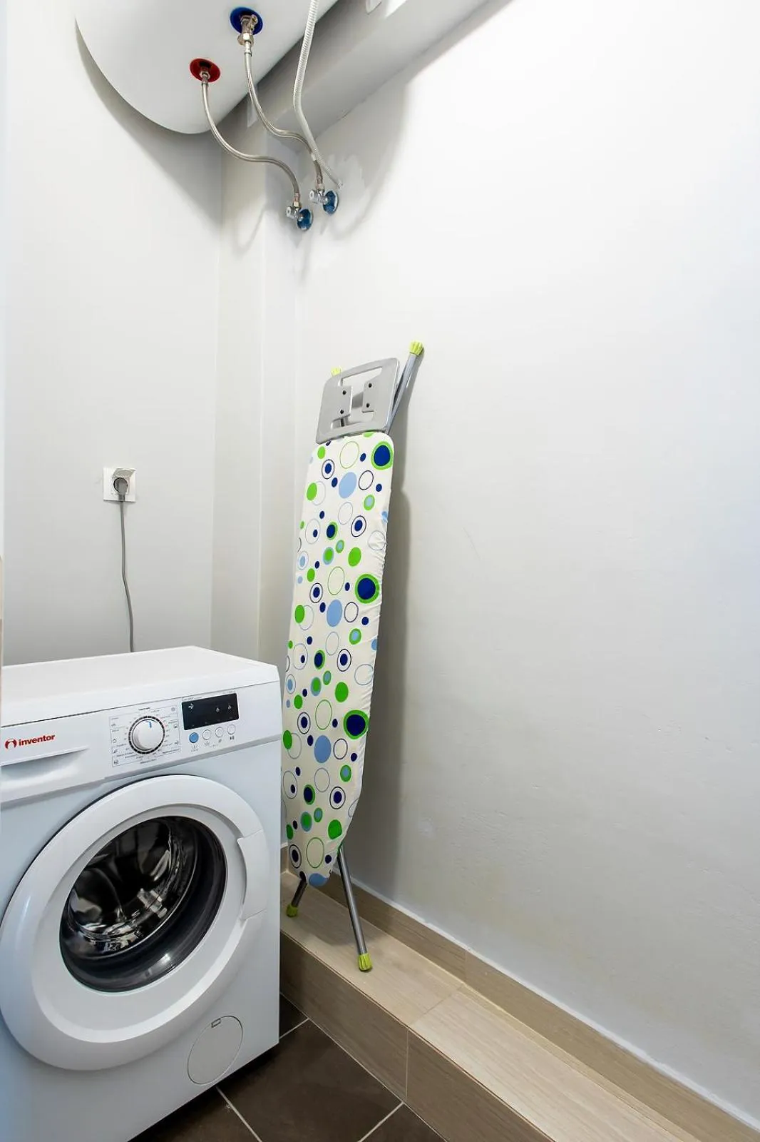 washing machine in Aris123 by Smart Cozy Suites - Apartments in the heart of Athens - 5 minutes from metro - Available 24hr