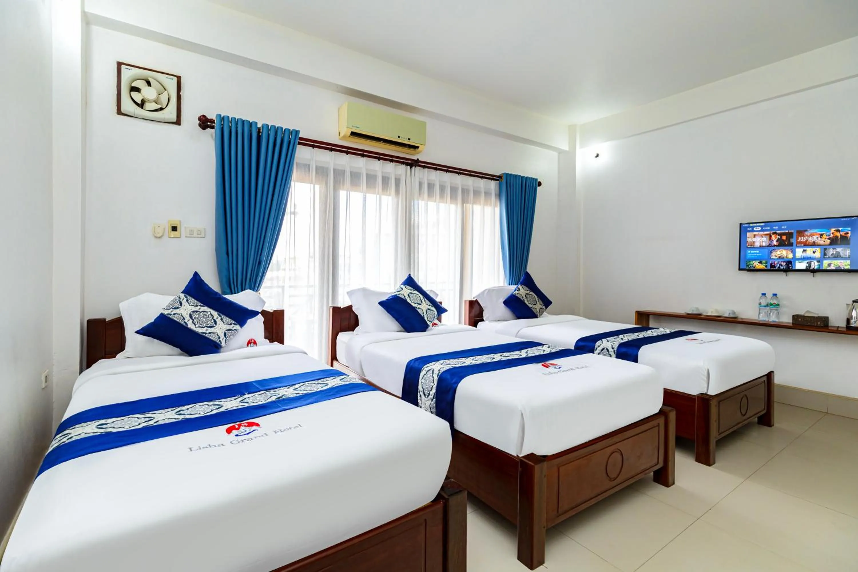 Photo of the whole room, Bed in Lisha The Grand Riverside Hotel