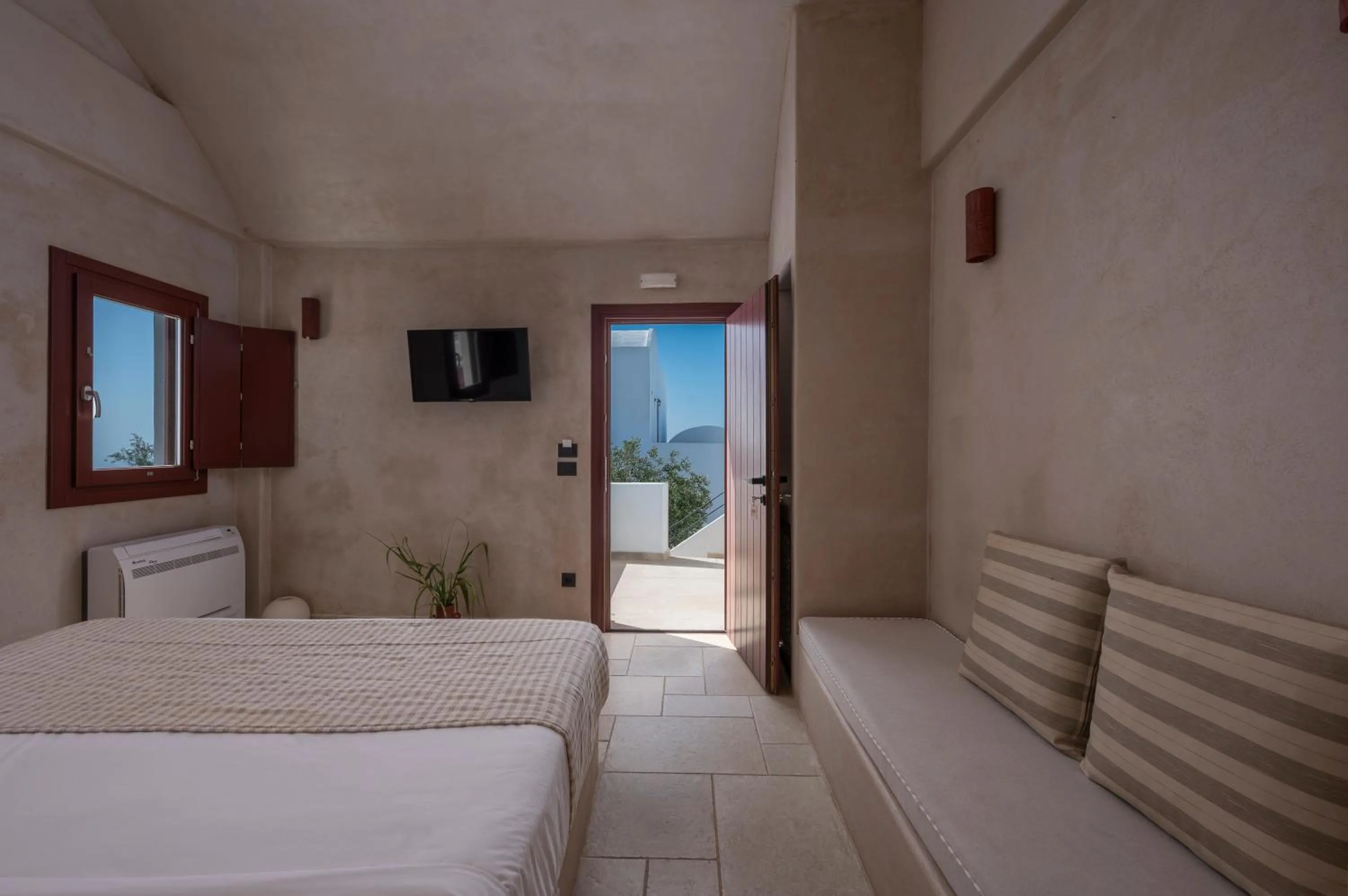 Bed in Meroviglia Boutique Hotel