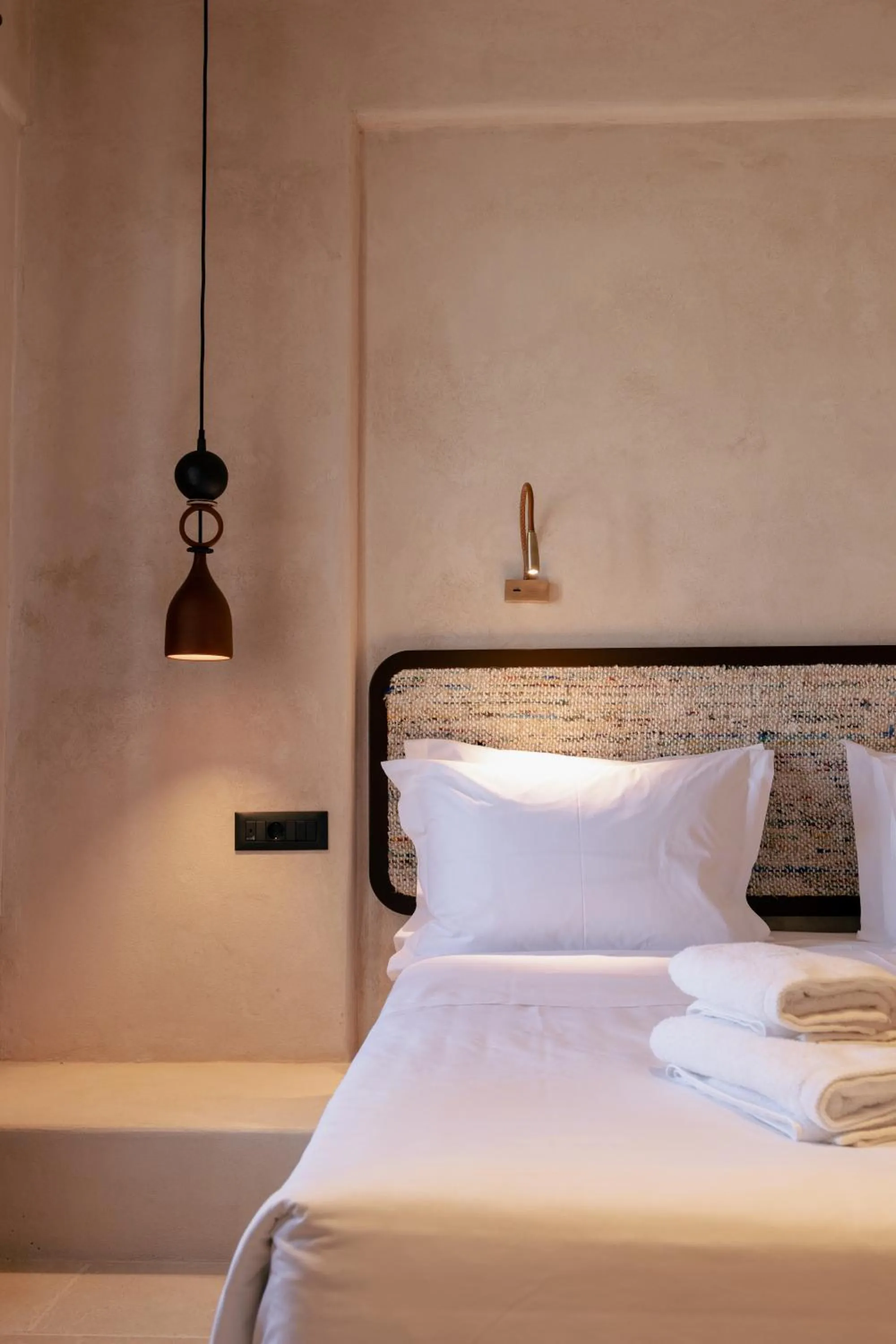 Bed in Meroviglia Boutique Hotel