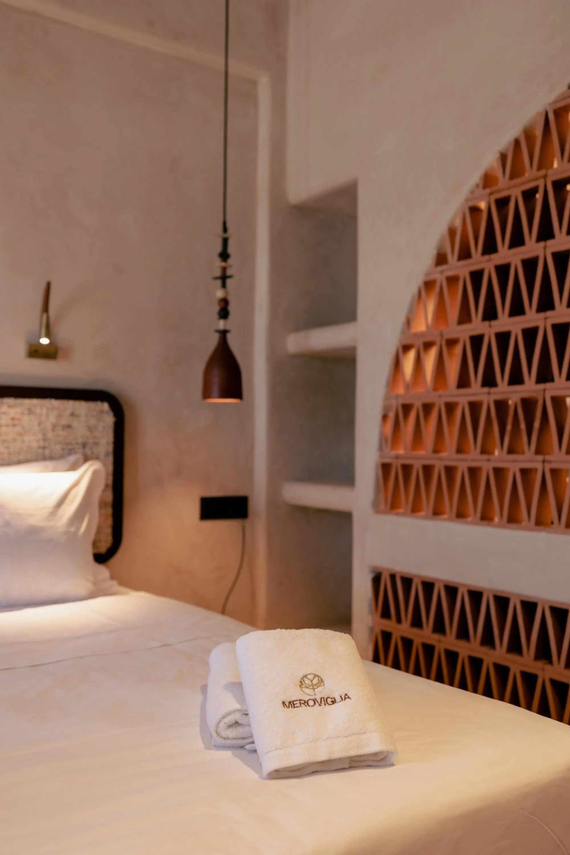Bed in Meroviglia Boutique Hotel