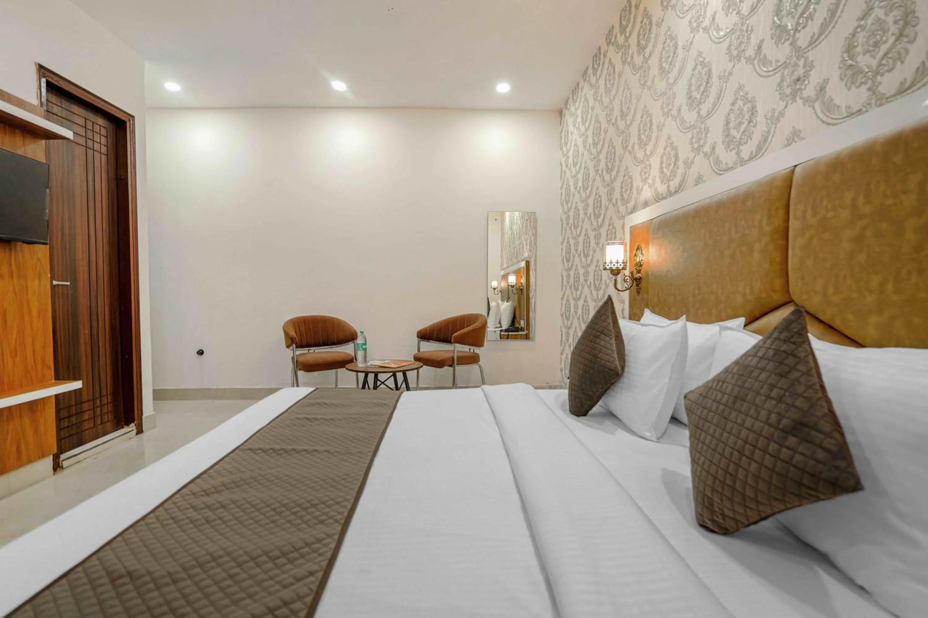 Photo of the whole room, Bed in Hotel Paras Chandigarh Zirakpur