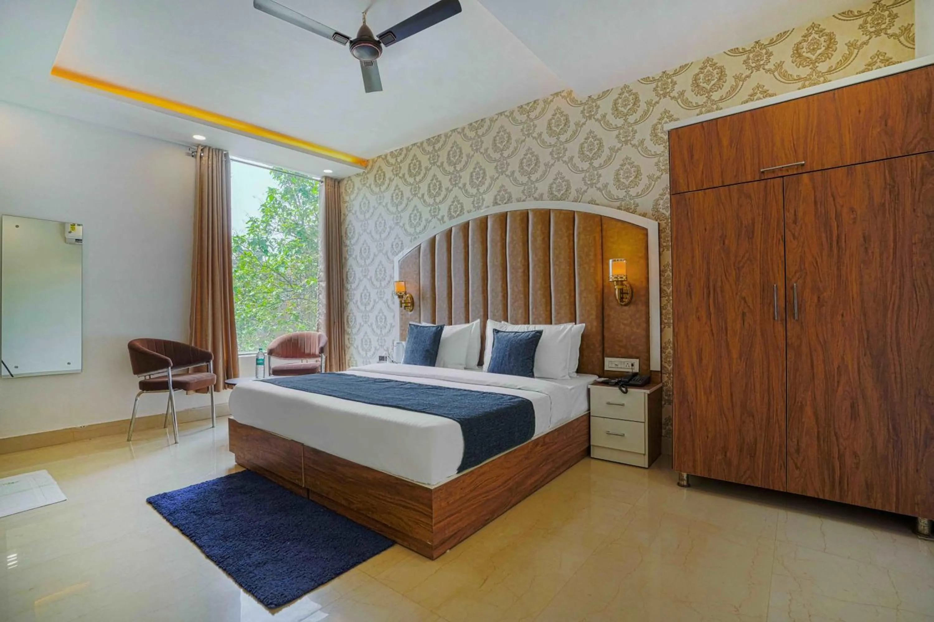 Photo of the whole room, Bed in Hotel Paras Chandigarh Zirakpur