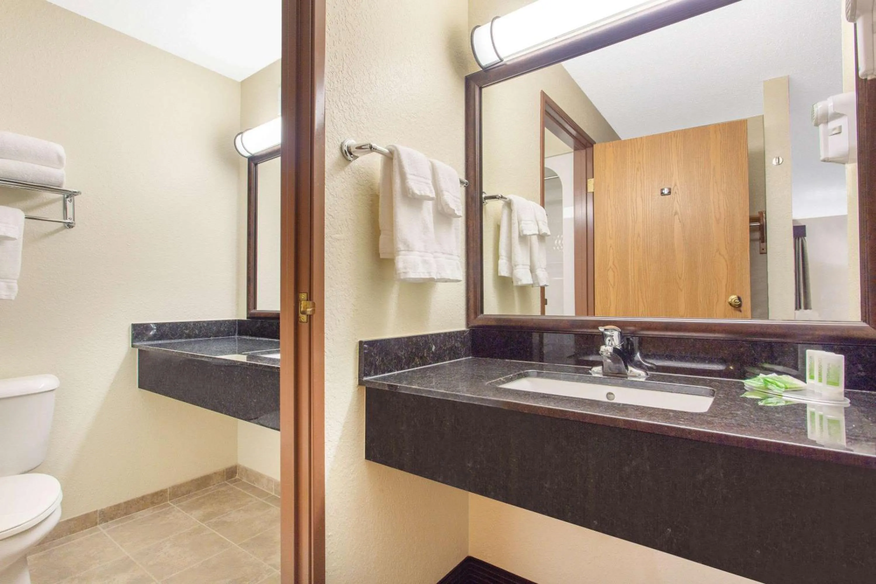 Bathroom in AmericInn by Wyndham Rhinelander