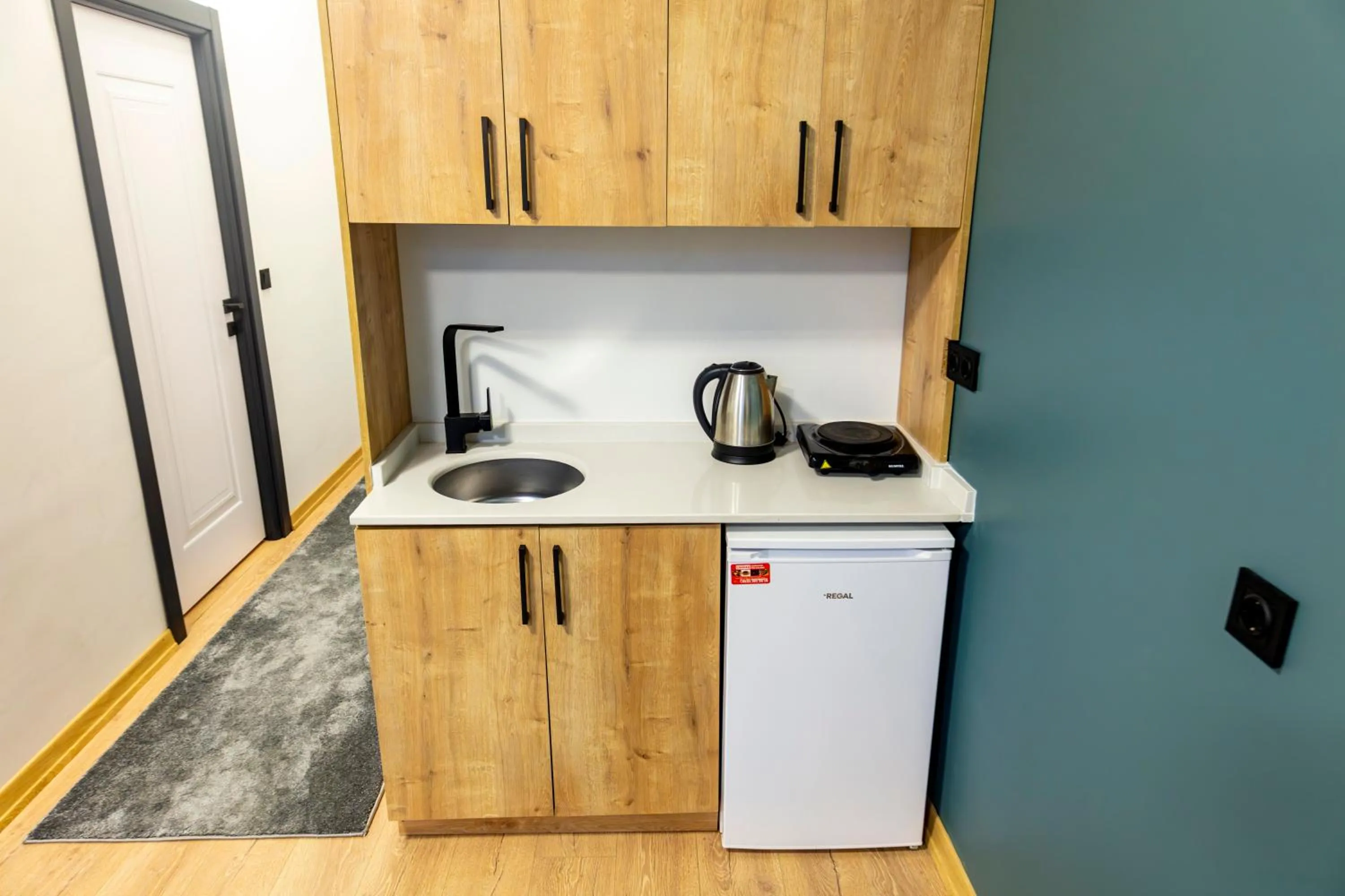 Kitchen or kitchenette in Mia Mia Suites