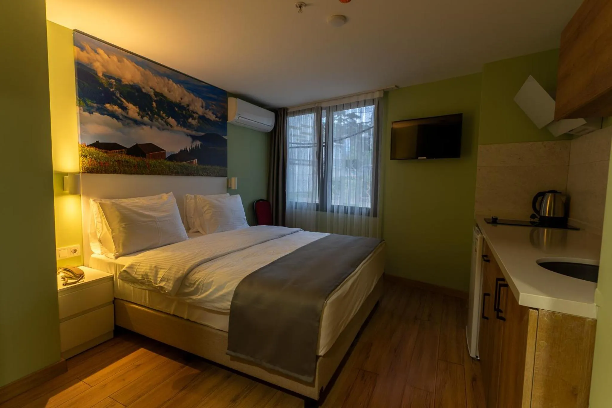 Bed in Yusufhan Suites