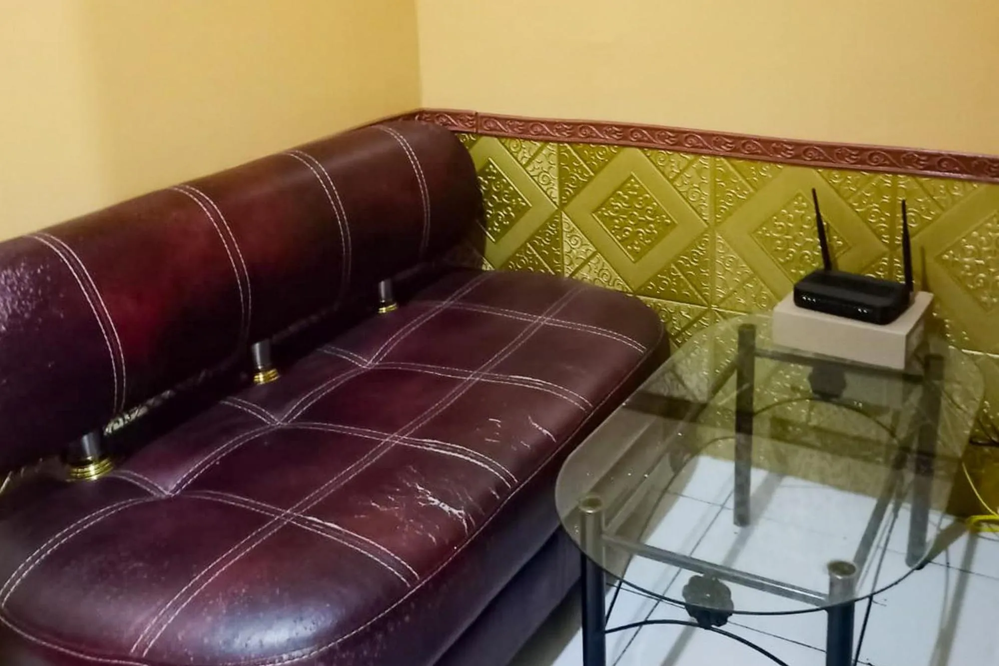 Living room in RedLiving Apartemen Modernland - Lian Property Tower Biru