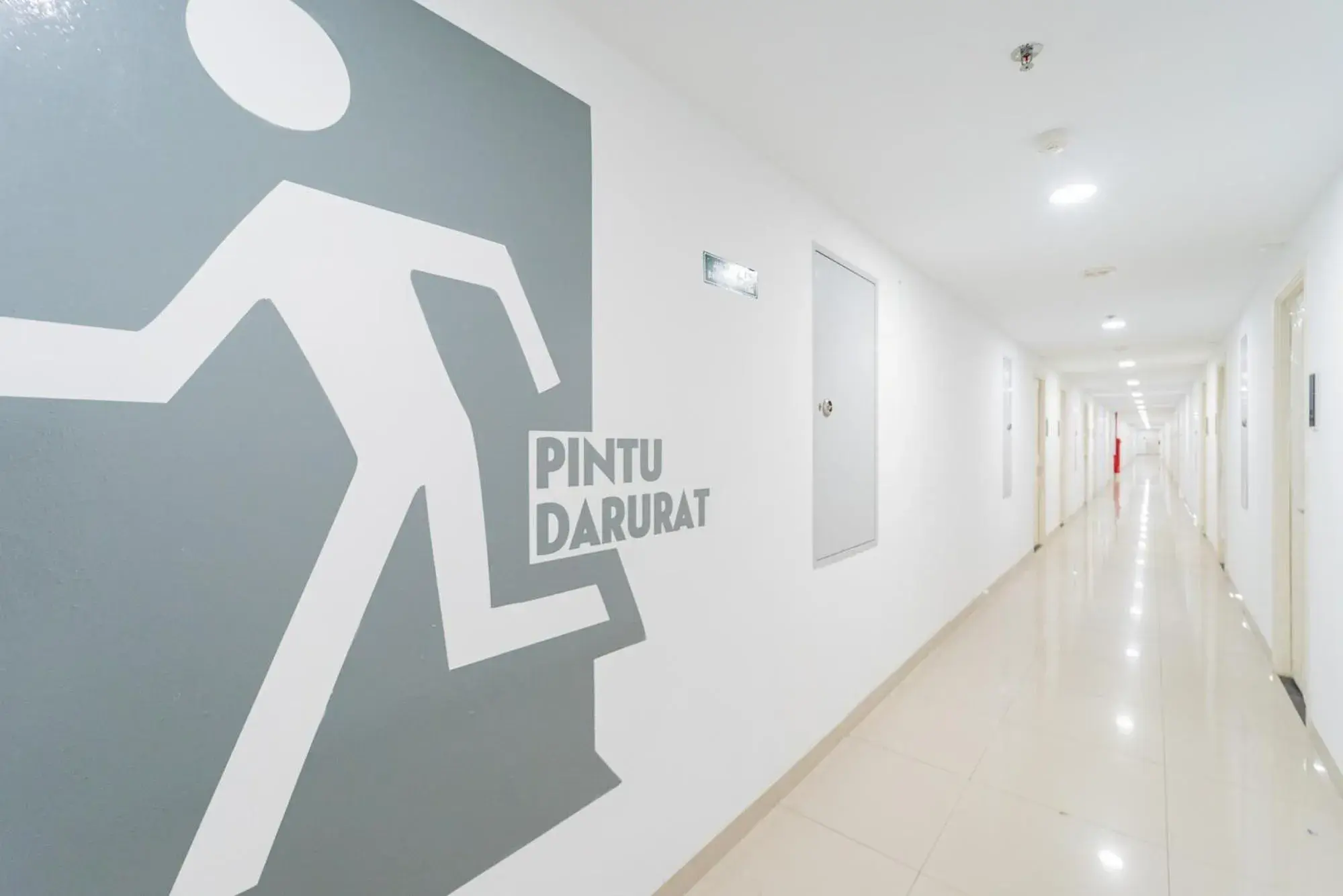 Property building in RedLiving Apartemen Patra Land Urbano - Happy Rooms Tower Mid-West with Netflix Property building in RedLiving Apartemen Patra Land Urbano - Happy Rooms Tower Mid-West with Netflix