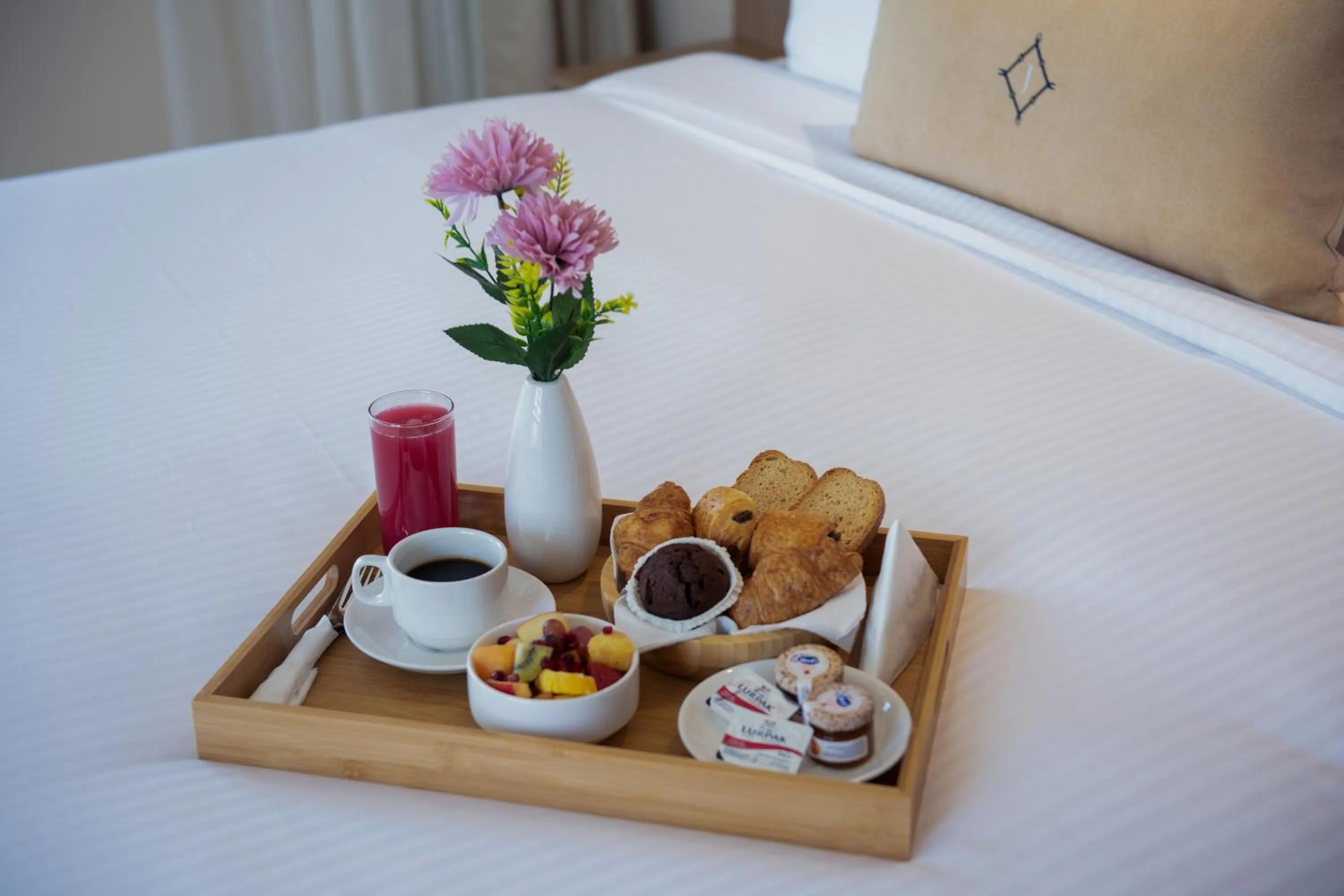 Bed in Jood Hotel Apartments