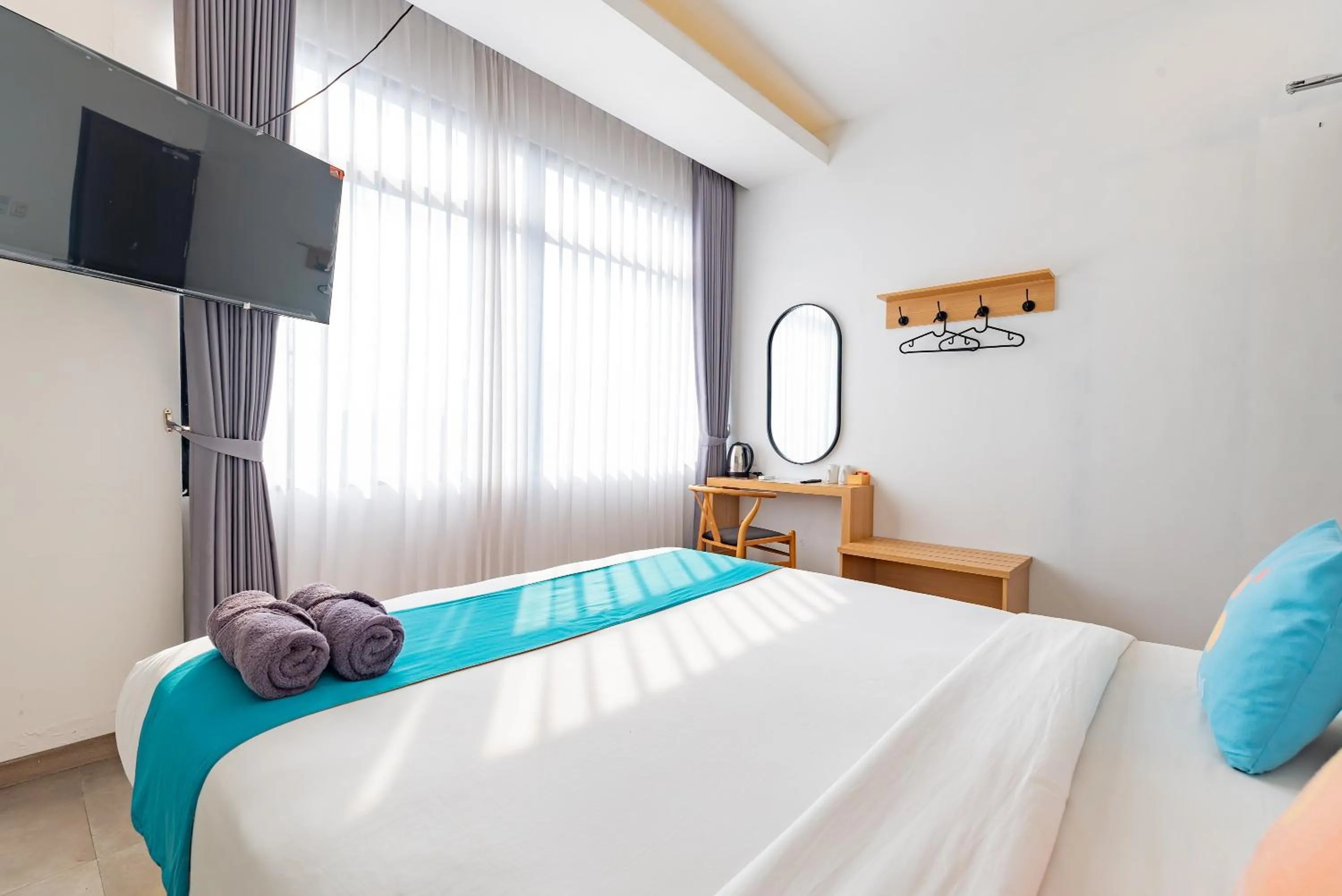 Bedroom, Bed in Sans Hotel Bobosini Malang by RedDoorz