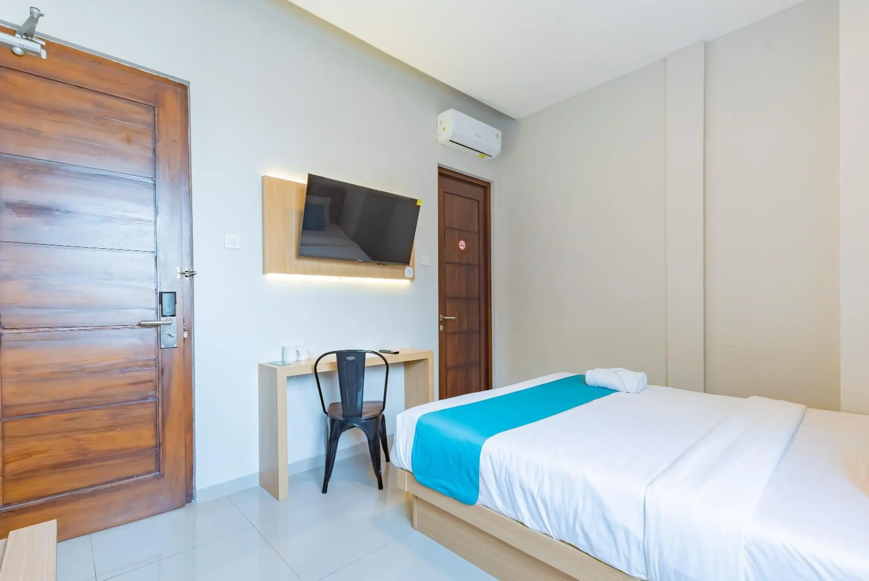 Bedroom, Bed in Sans Hotel Bobosini Malang by RedDoorz Bedroom, Bed in Sans Hotel Bobosini Malang by RedDoorz