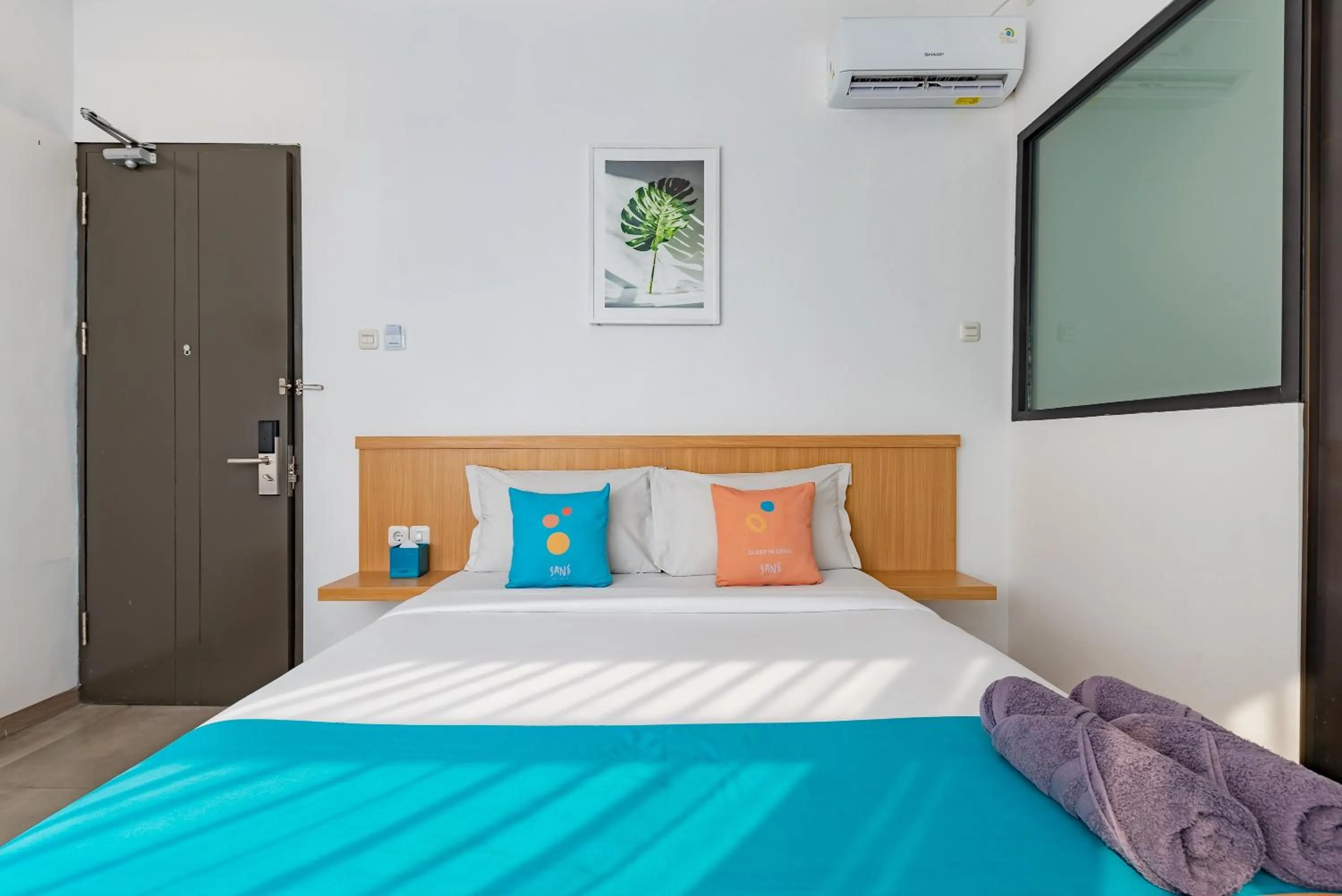 Bedroom, Bed in Sans Hotel Bobosini Malang by RedDoorz