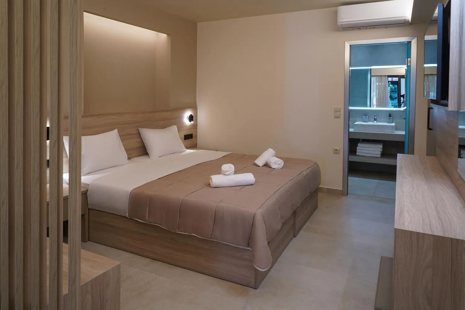 Bed in Nepheli Apartments and Studios