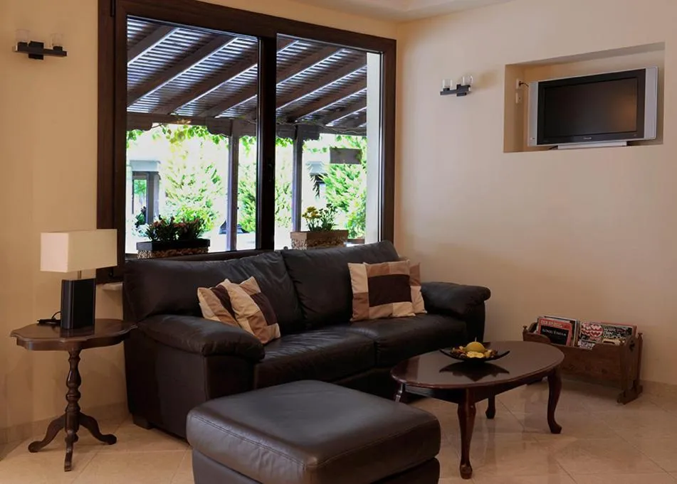 Communal lounge/ TV room in Nepheli Apartments and Studios