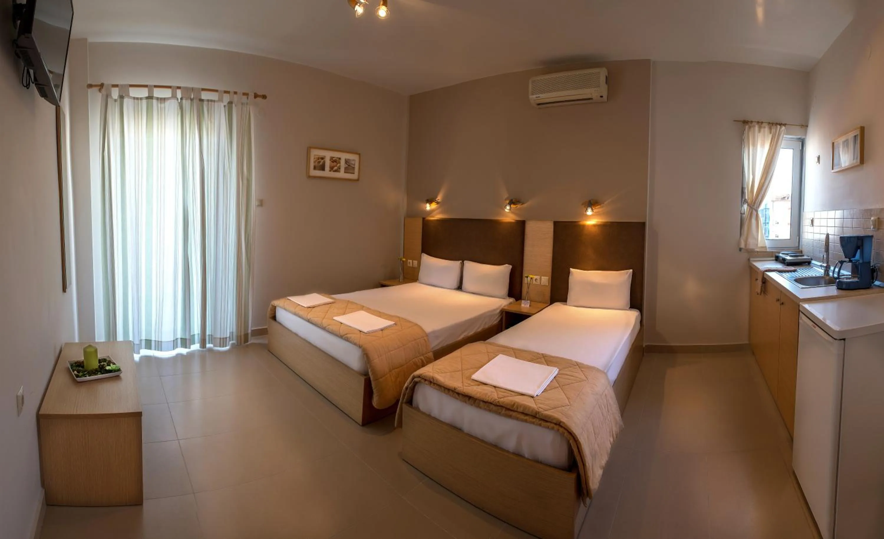 Kitchen or kitchenette, Bed in Nepheli Apartments and Studios