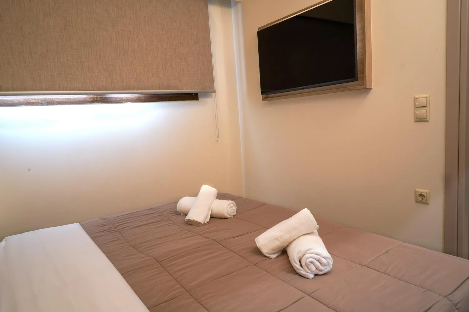 Bed in Nepheli Apartments and Studios