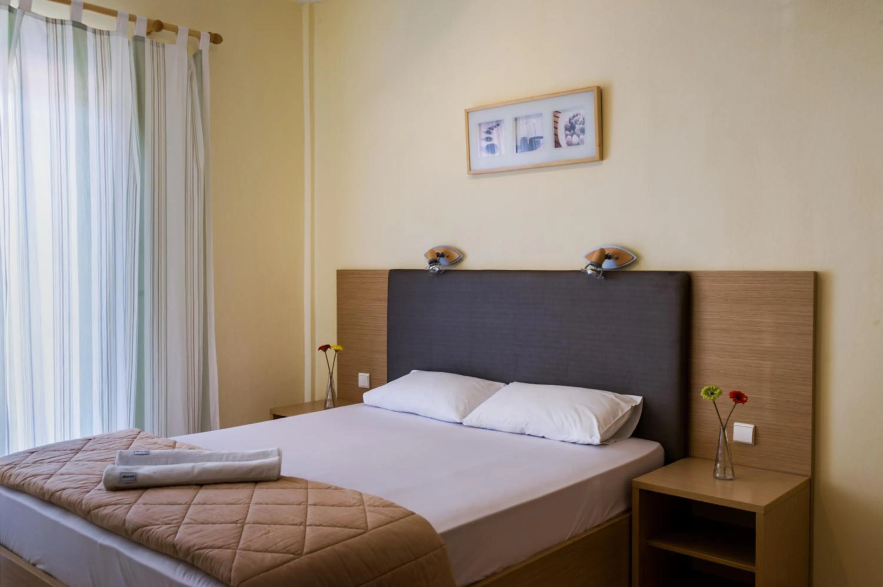 Bed in Nepheli Apartments and Studios