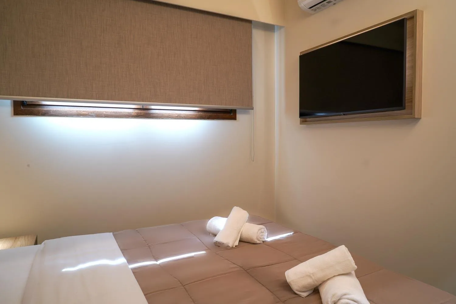 Bed in Nepheli Apartments and Studios