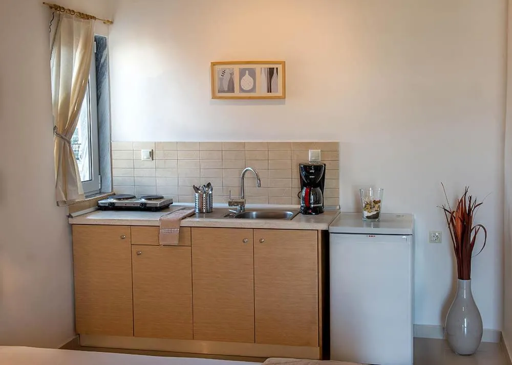Kitchen or kitchenette in Nepheli Apartments and Studios