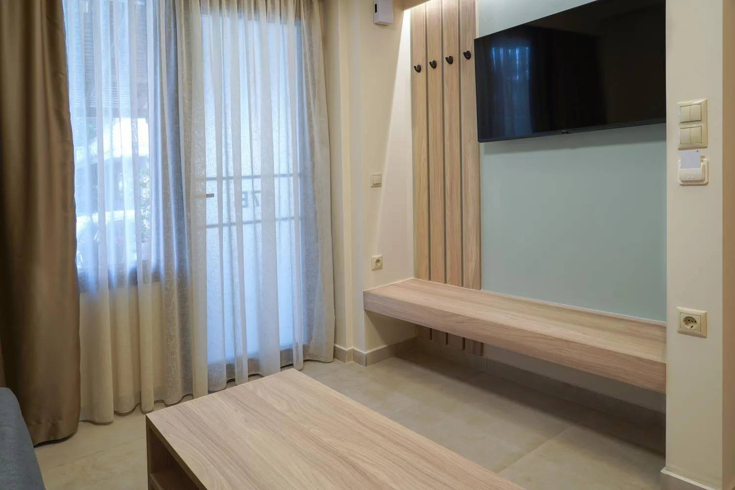Communal lounge/ TV room in Nepheli Apartments and Studios