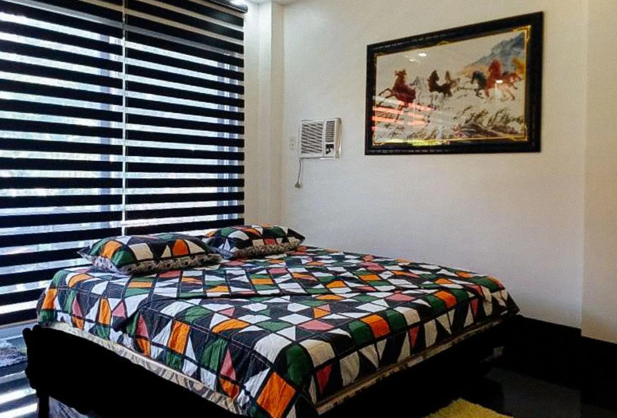 Bed in KrizLion Hotel