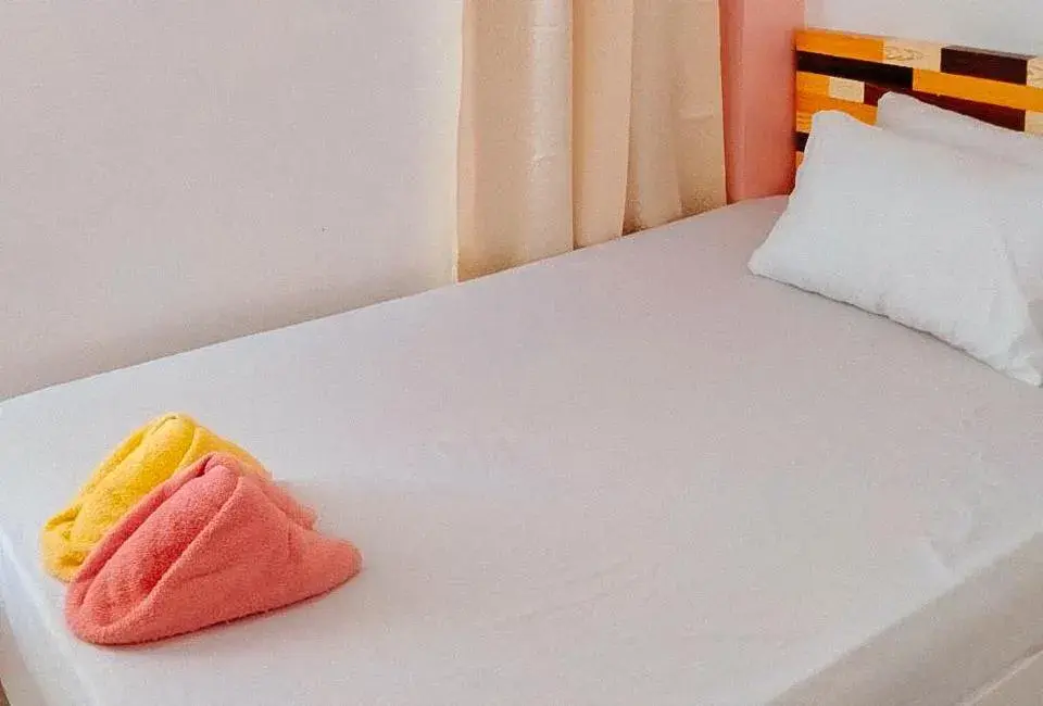 Bed in RedDoorz @ Jmalls Island Tourist Inn Dinagat Island Bed in RedDoorz @ Jmalls Island Tourist Inn Dinagat Island