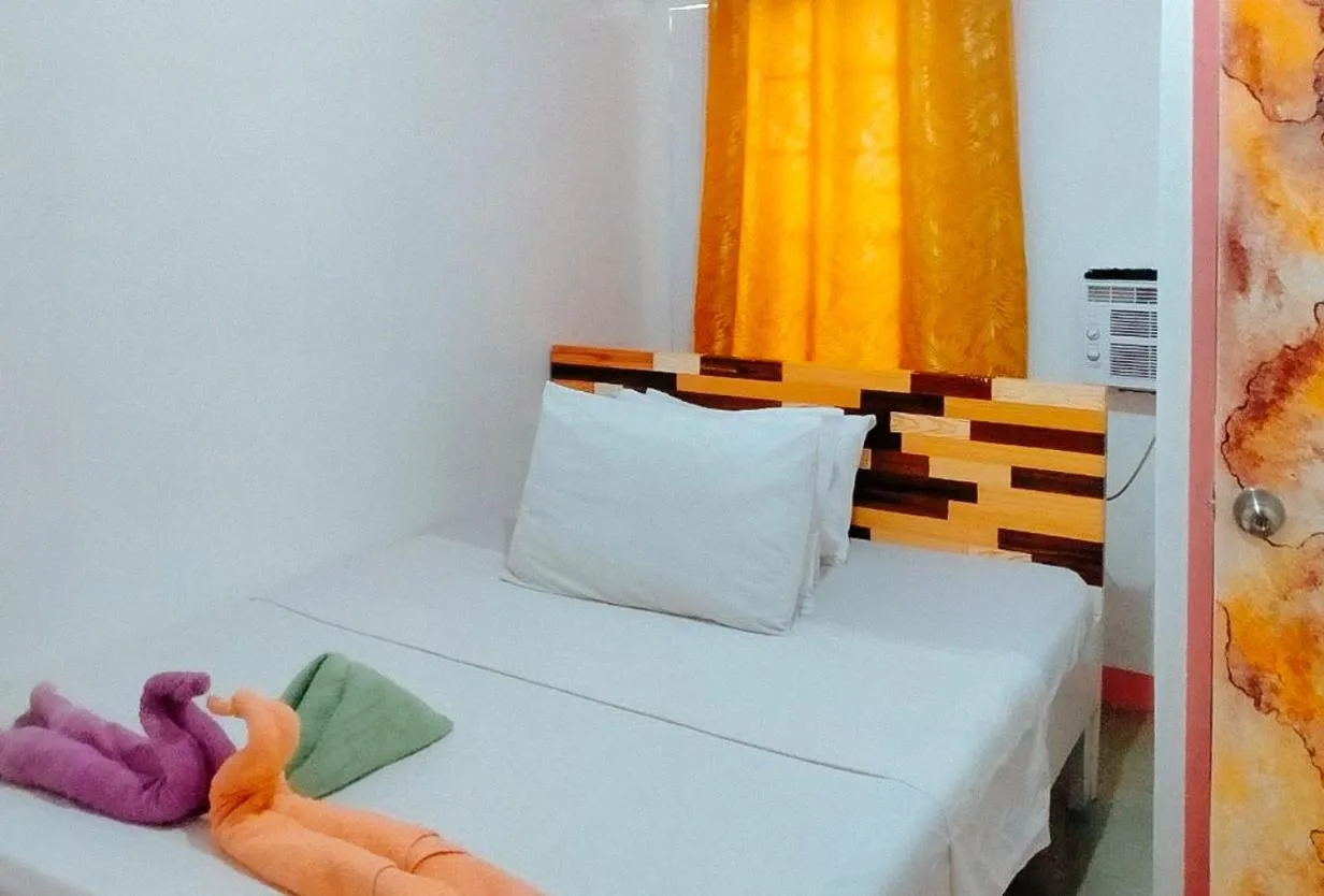 Shower, Bed in RedDoorz @ Jmalls Island Tourist Inn Dinagat Island