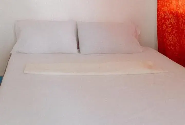 Bed in RedDoorz @ Jmalls Island Tourist Inn Dinagat Island Bed in RedDoorz @ Jmalls Island Tourist Inn Dinagat Island