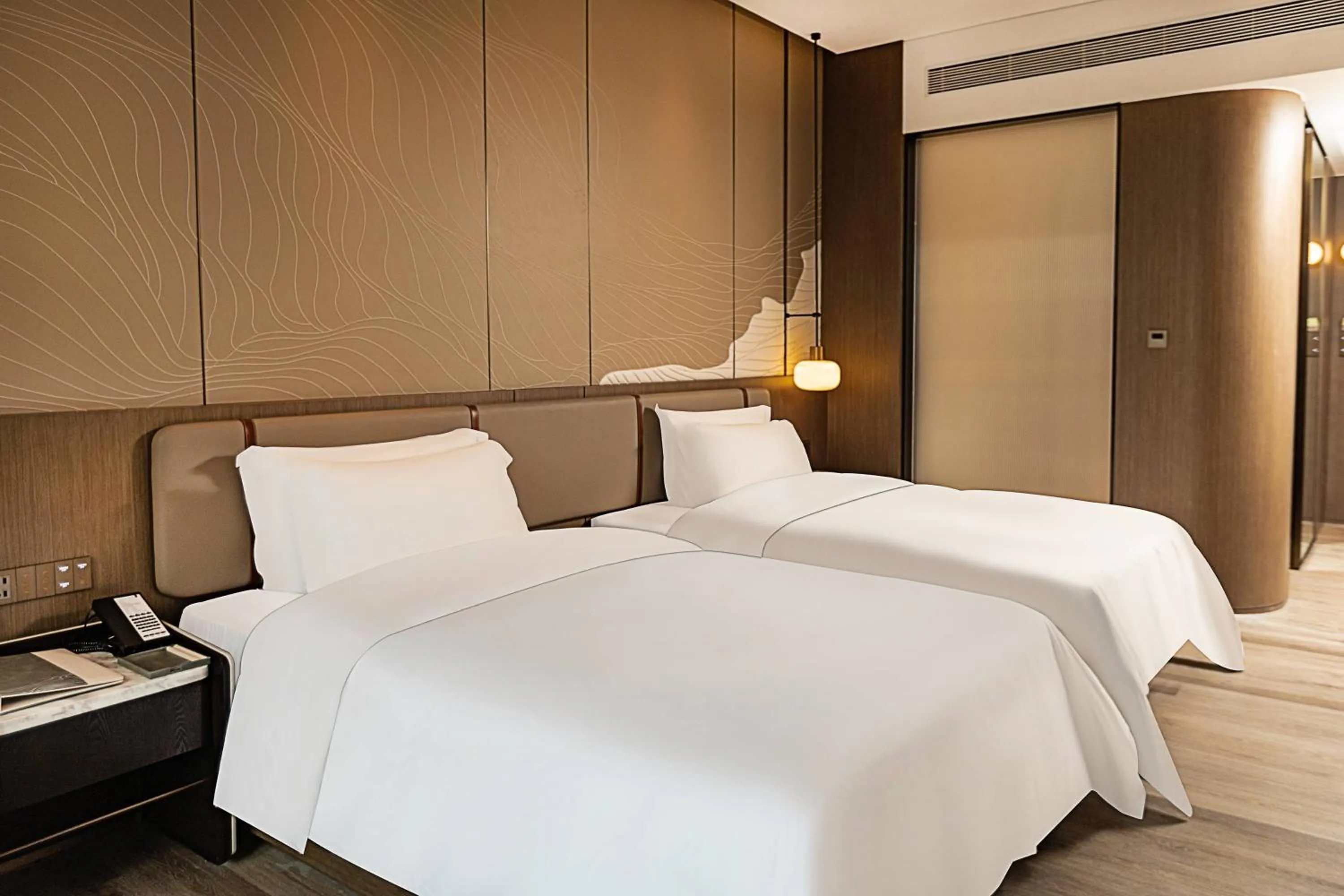 Bed in Wyndham Garden Gaozhou