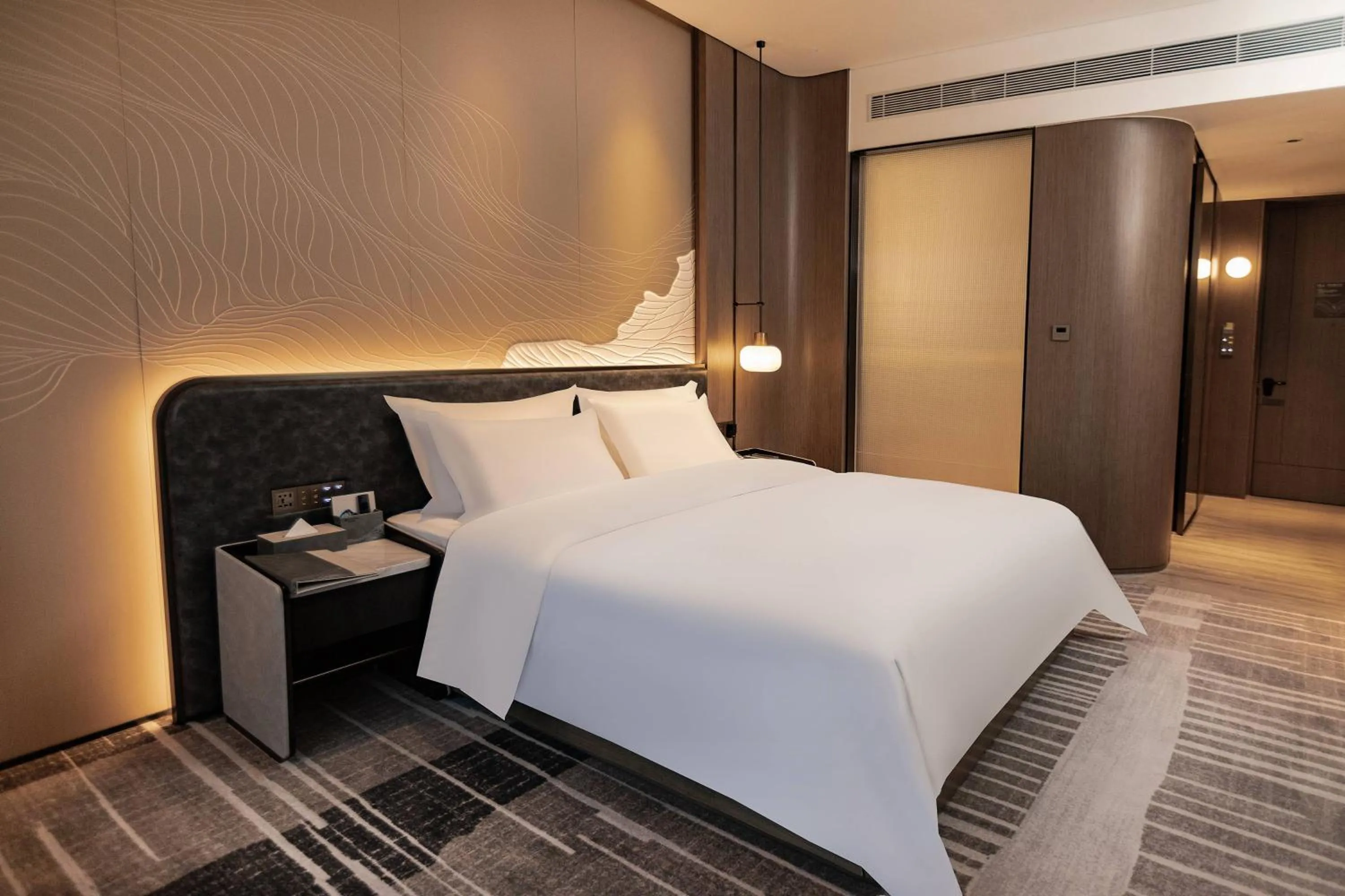 Bed in Wyndham Garden Gaozhou