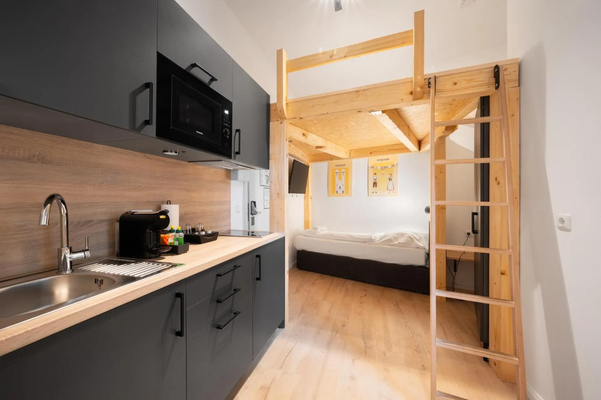 Bed in Servus Apartments by Homaris