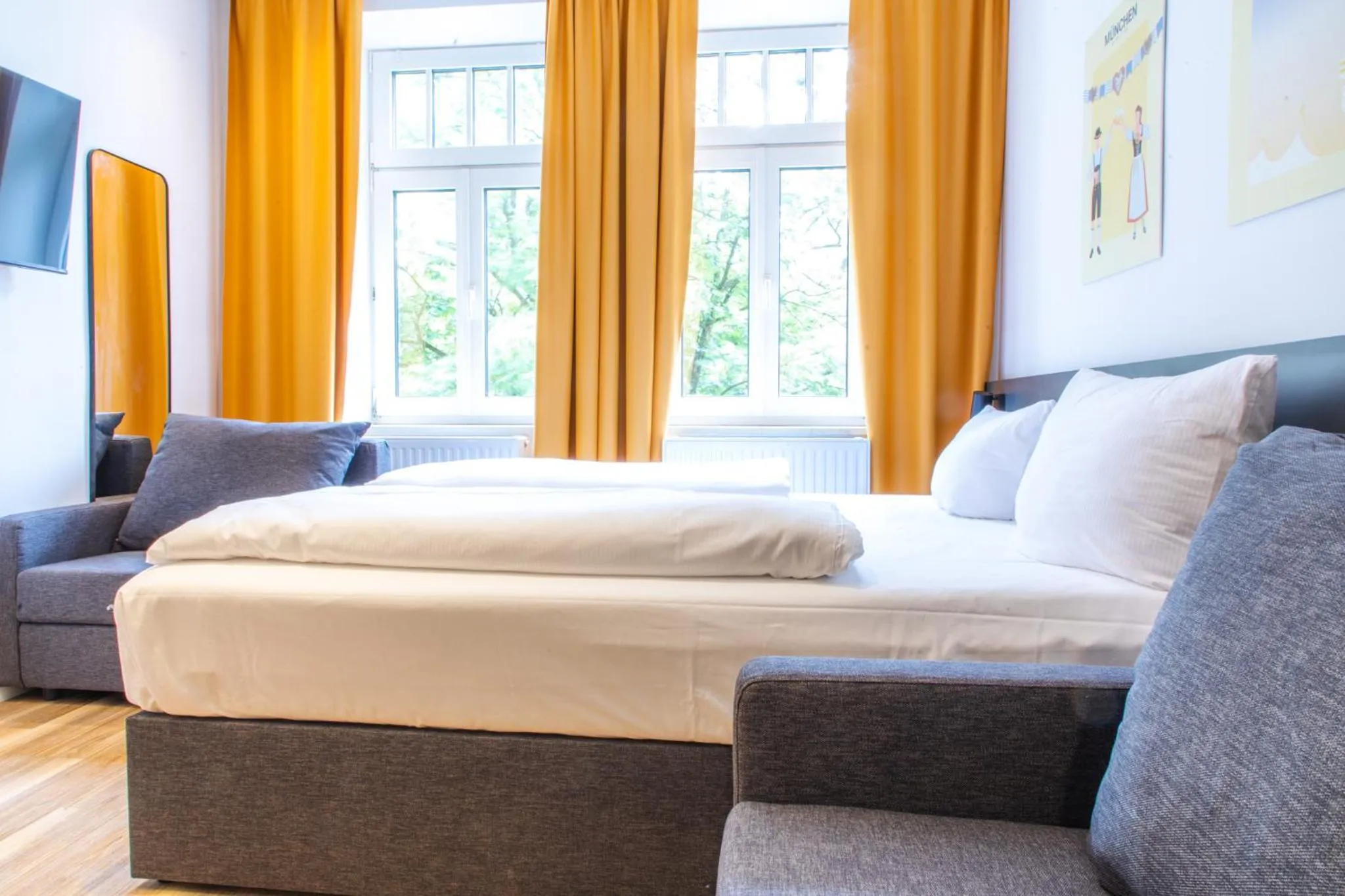 Bed in Servus Apartments by Homaris
