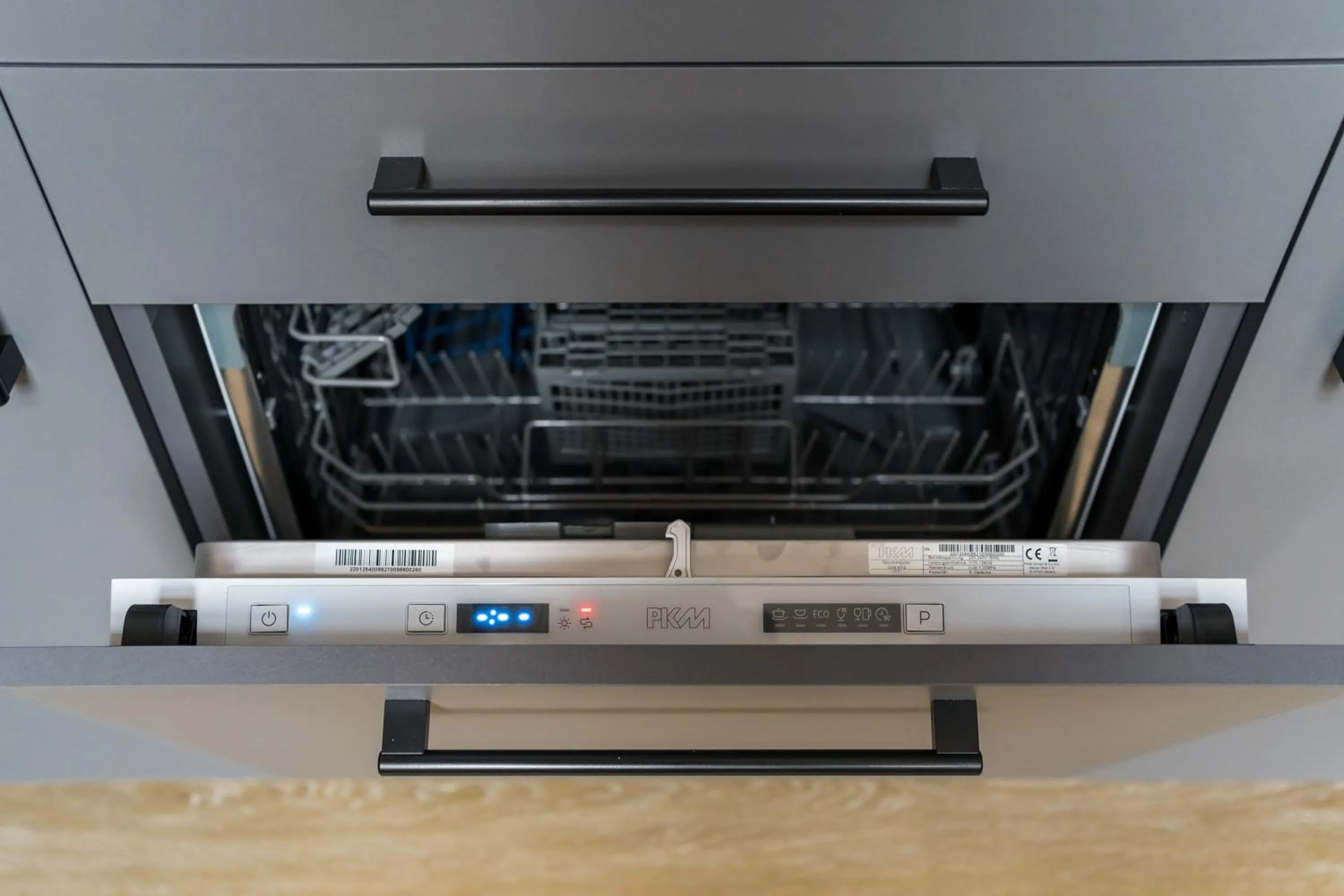 dishwasher in Servus Apartments by Homaris