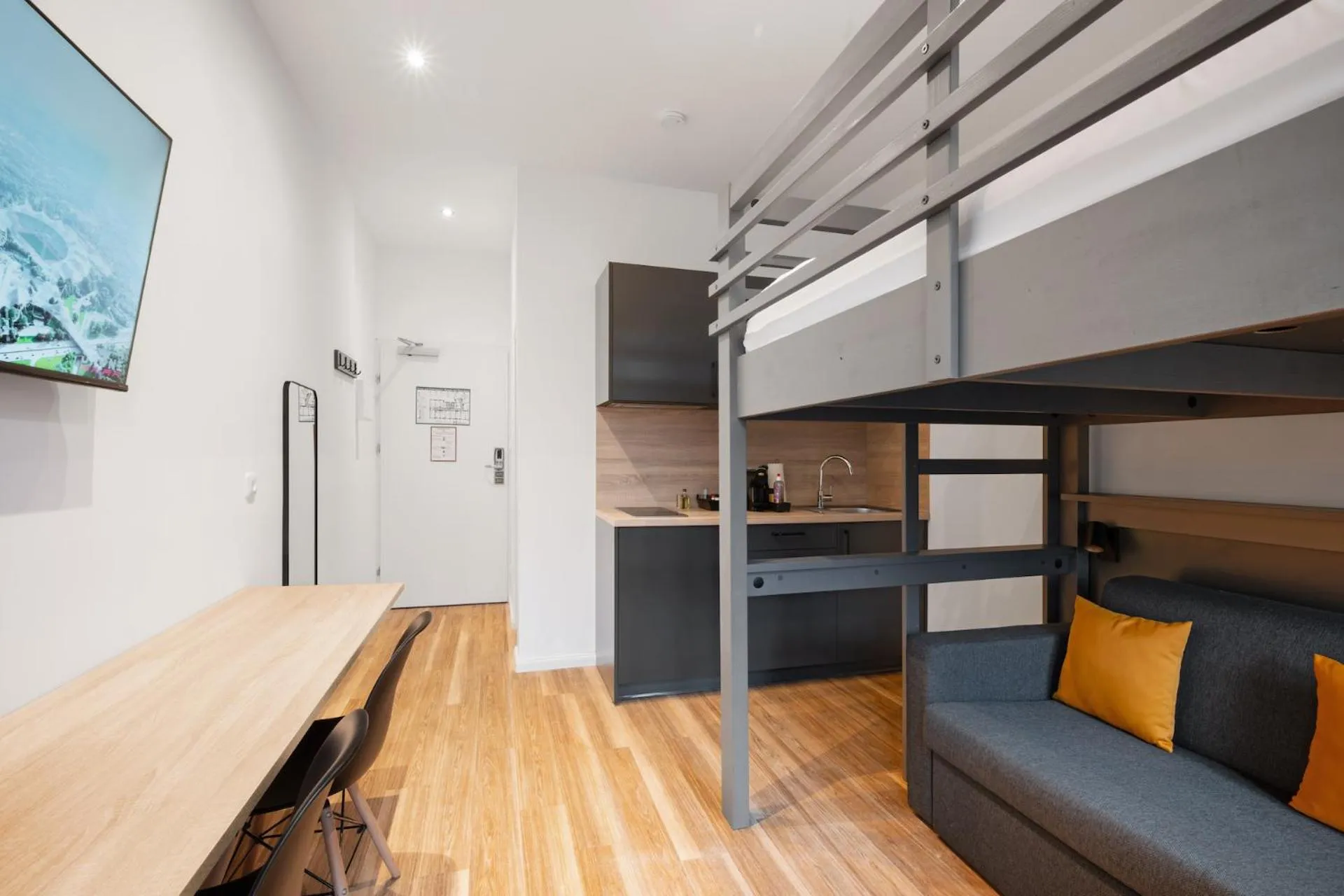 Bed in Servus Apartments by Homaris