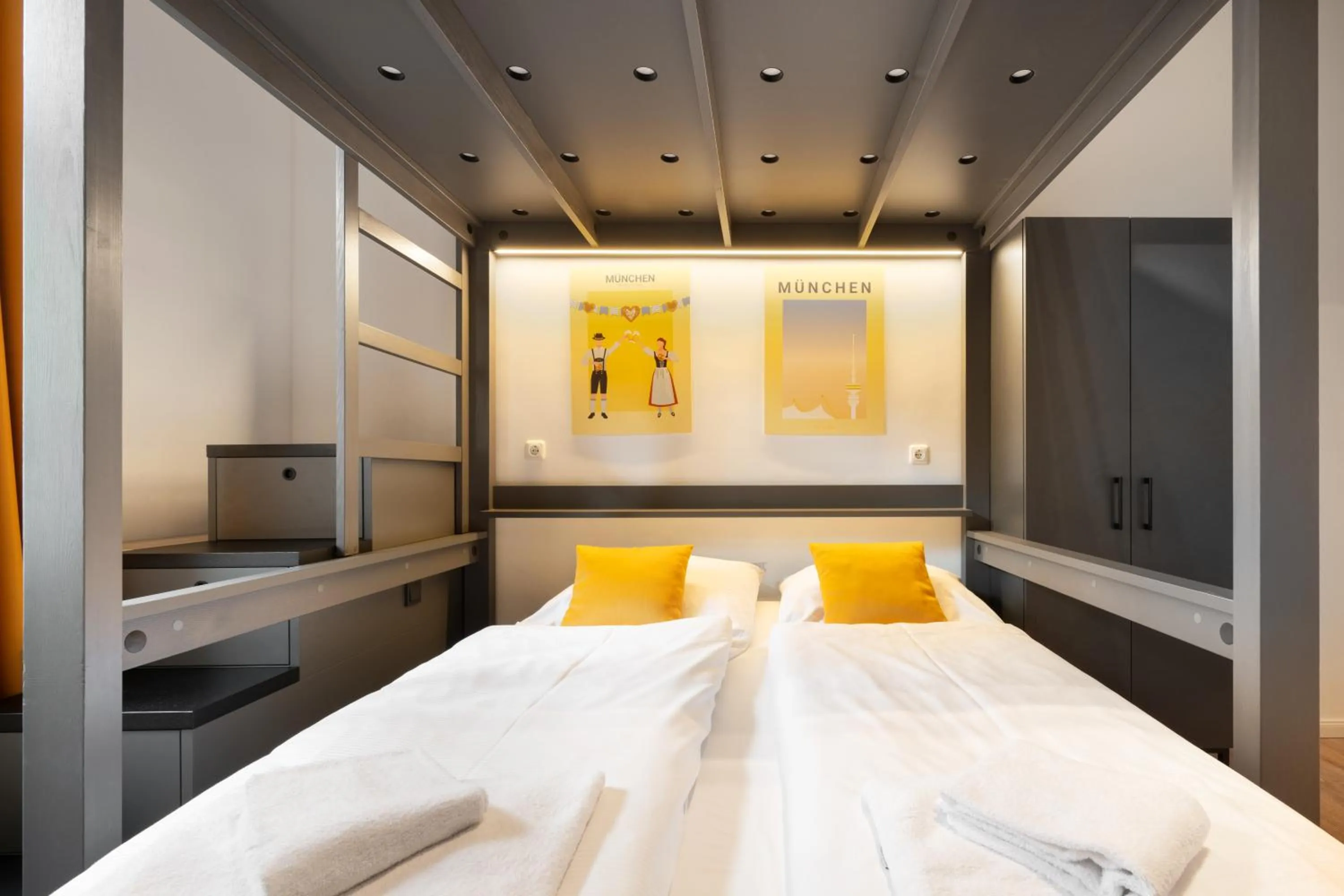 Bed in Servus Apartments by Homaris