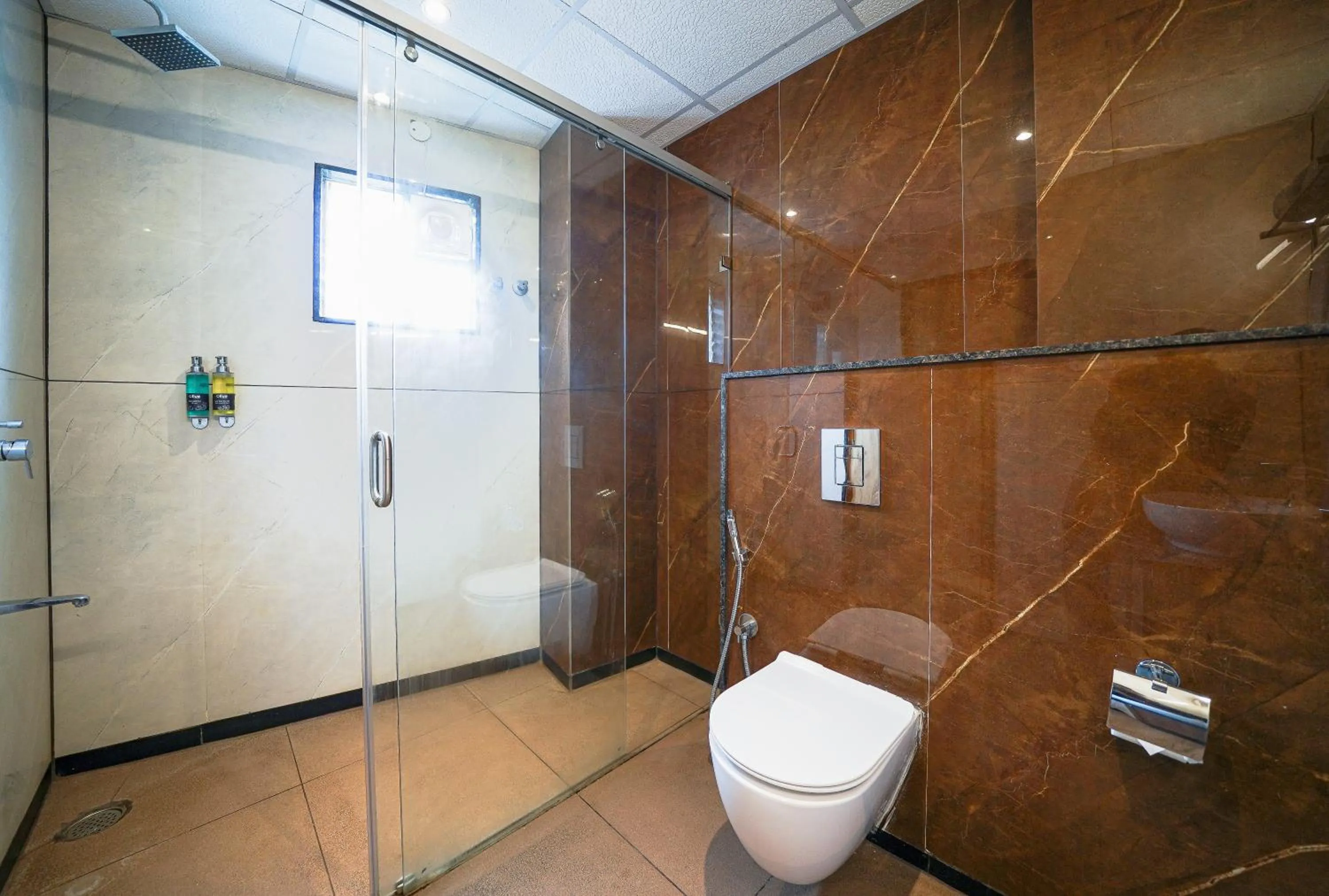 Shower in Olive Hotel HAL 2nd Stage by Embassy Group