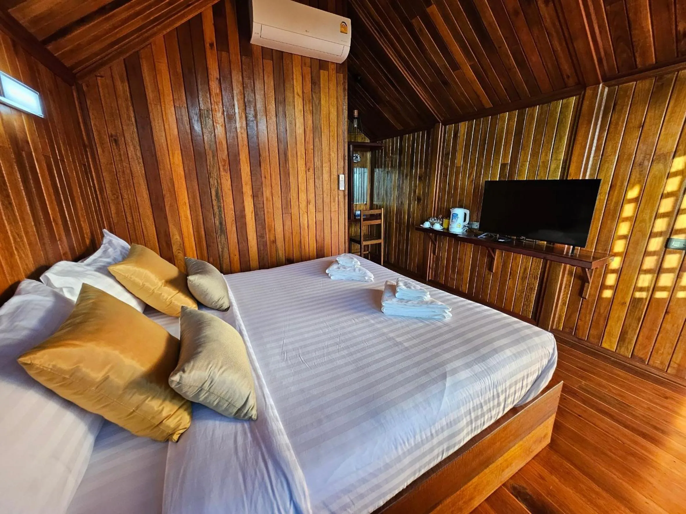 Bed in So View Phuket Resort