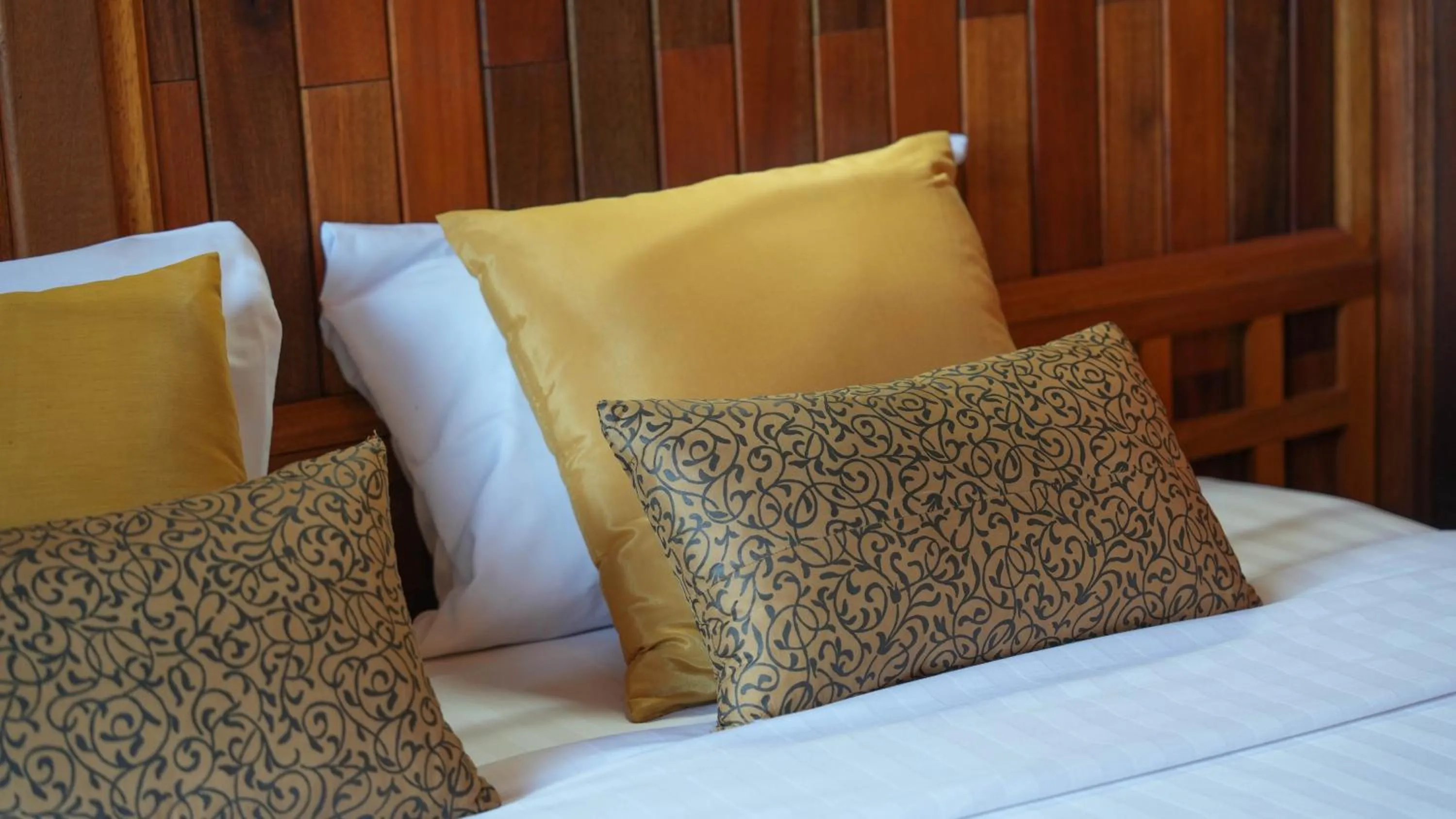 Bed in So View Phuket Resort