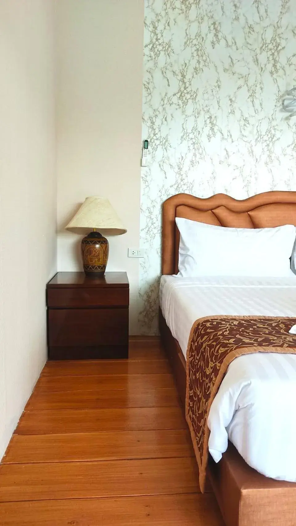 Bed in So View Phuket Resort Bed in So View Phuket Resort