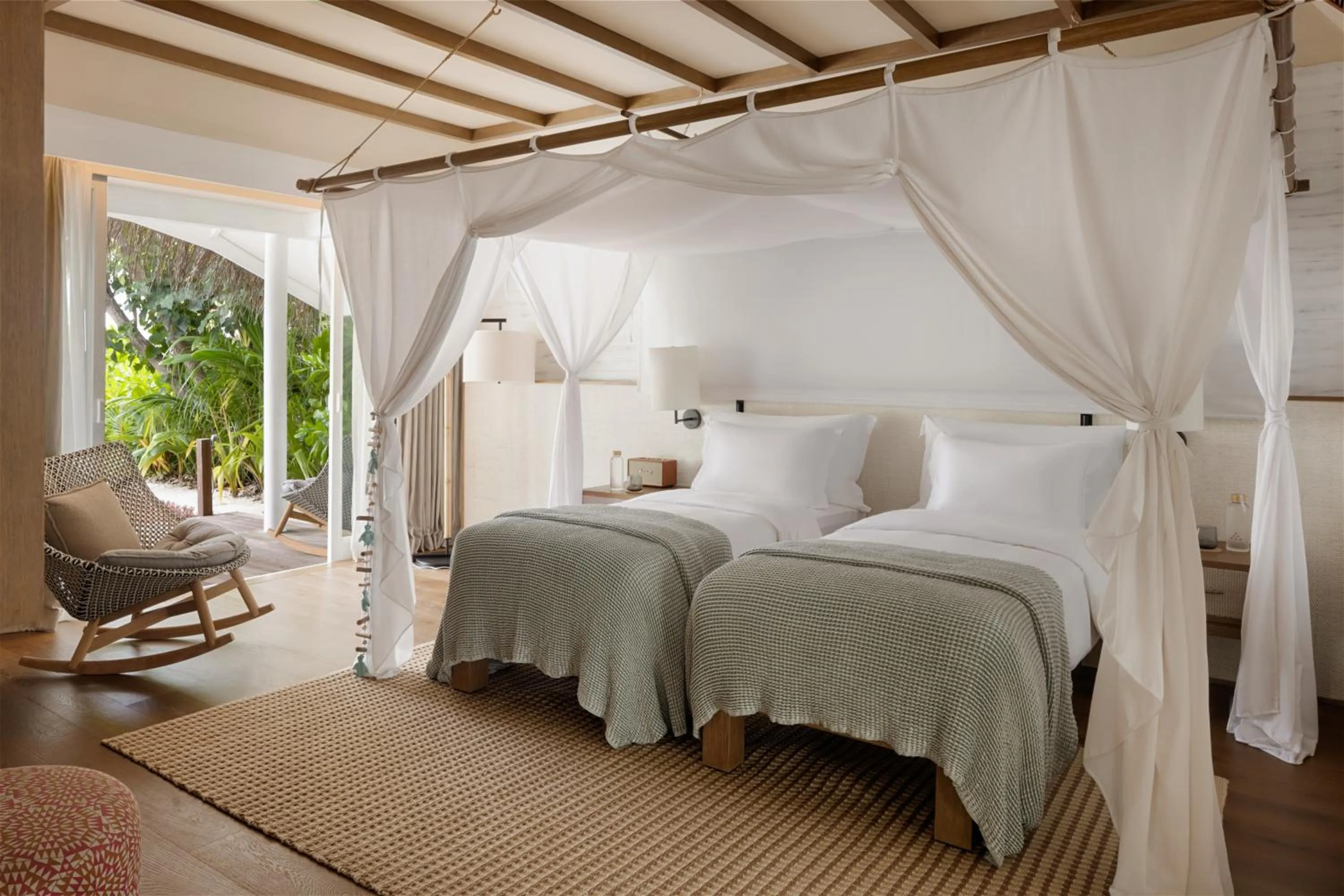 Bed in Six Senses Kanuhura