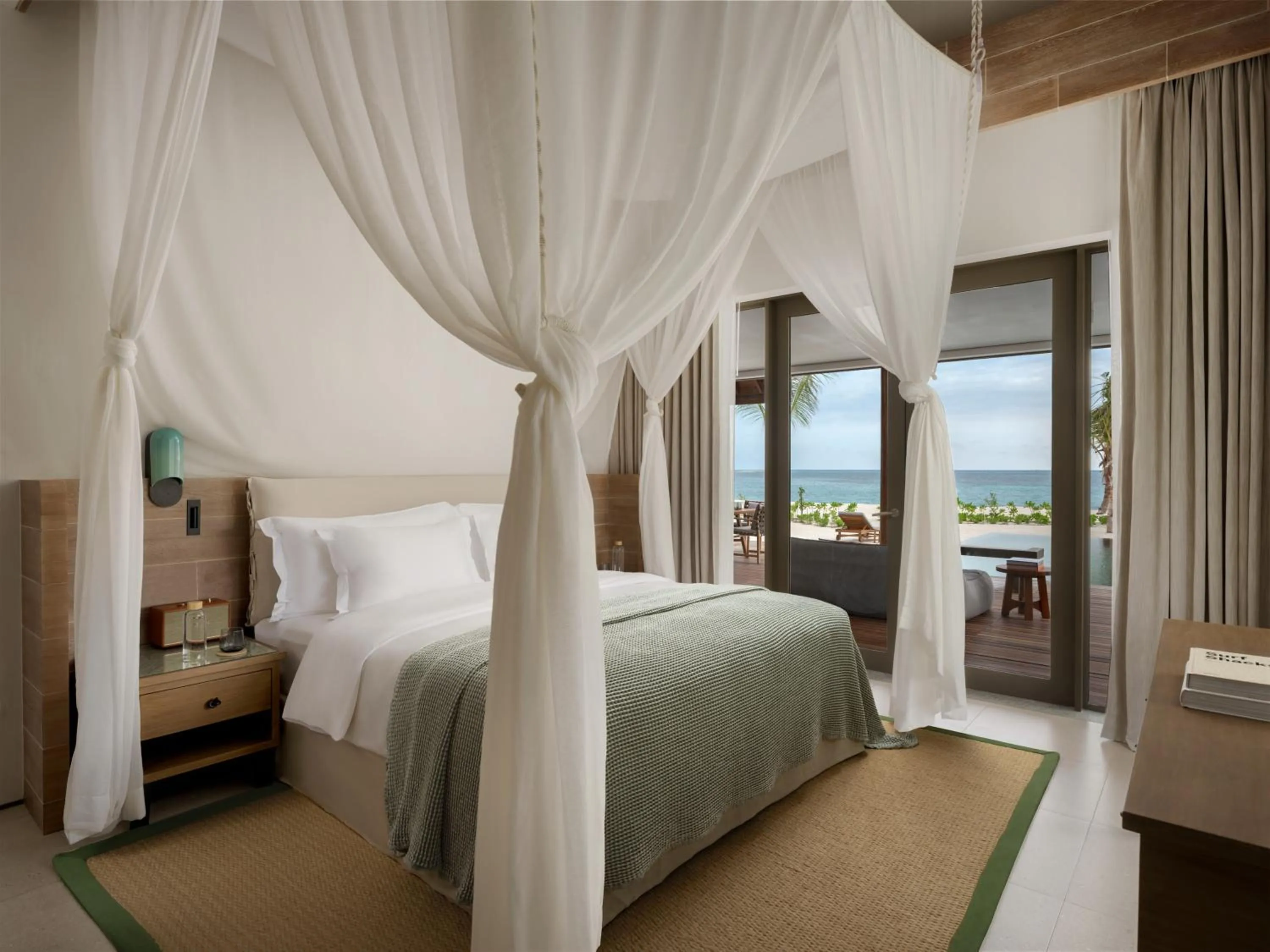 Bed in Six Senses Kanuhura